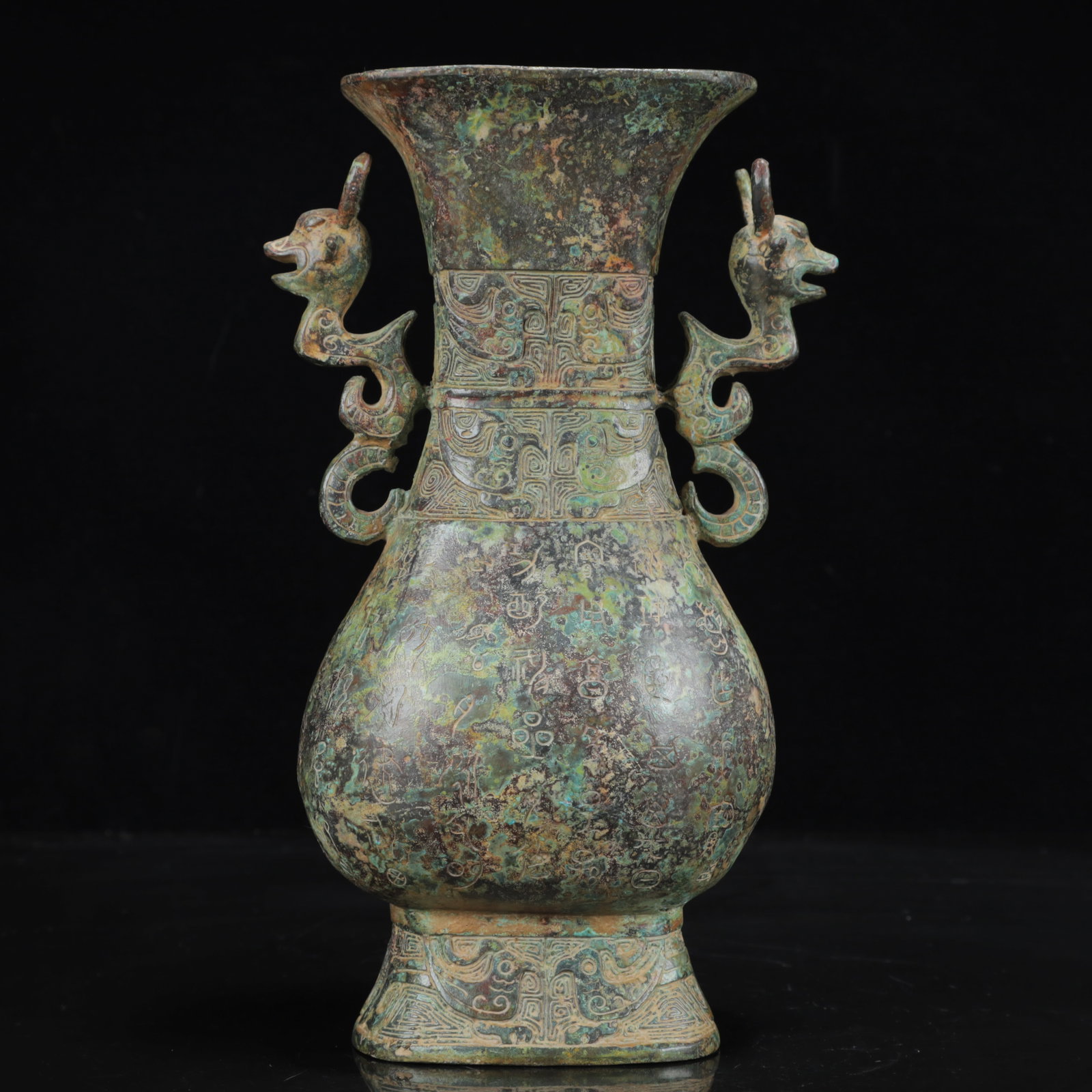 An Archaic Bronze Inscription Beast-Ears Vase: An Archaic Bronze Inscription Beast-Ears Vase,the Warring States Period in China,Size:5.9inx3.5inx9.8in,Weight:1750g 青铜铭文兽耳瓶,中国战&#