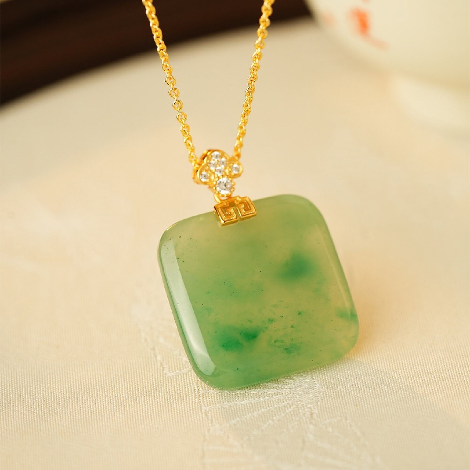 An Exquisite Sterling Silver-Gold Plated Inlaid Jadeite Pendant,Inlaid Diamond: An Exquisite Sterling Silver-Gold Plated Inlaid Jadeite Pendant,Inlaid Diamond 纯银镀金镶翡翠吊坠,嵌钻石