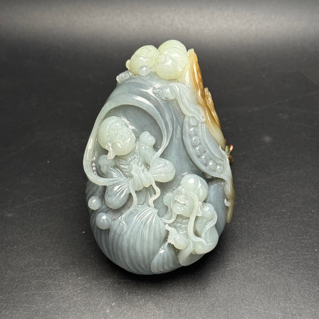 An Exquisite White Jade Statue of Arhat Pattern Hand Piece: An Exquisite White Jade Statue of Arhat Pattern Hand Piece,Qing Dynasty,China,Size:93mmx62mmx36mm,Weight:279g 白玉罗汉像纹手把件,中国&