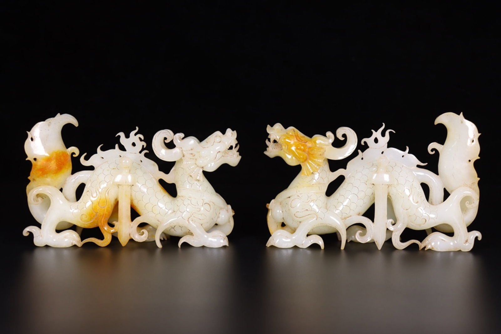 A Pair of Exquisite White Jade Dragon Ornaments
