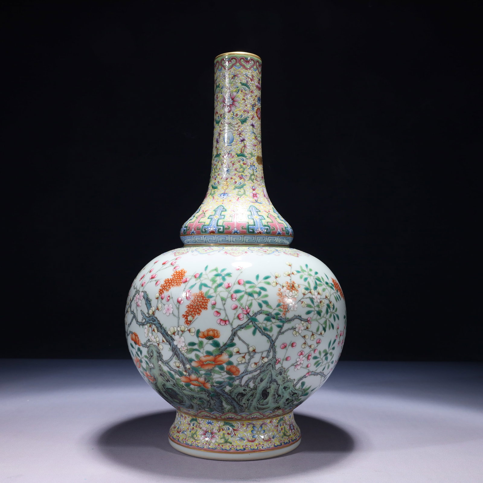 An Exquisite Famille-Rose Painted Gold Flower Pattern Gourd-Shaped Vase: An Exquisite Famille-Rose Painted Gold Flower Pattern Gourd-Shaped Vase,Qing Dynasty,China,Qianlong Six-character Mark,Size:8.3inx16.1in,Weight:3550g