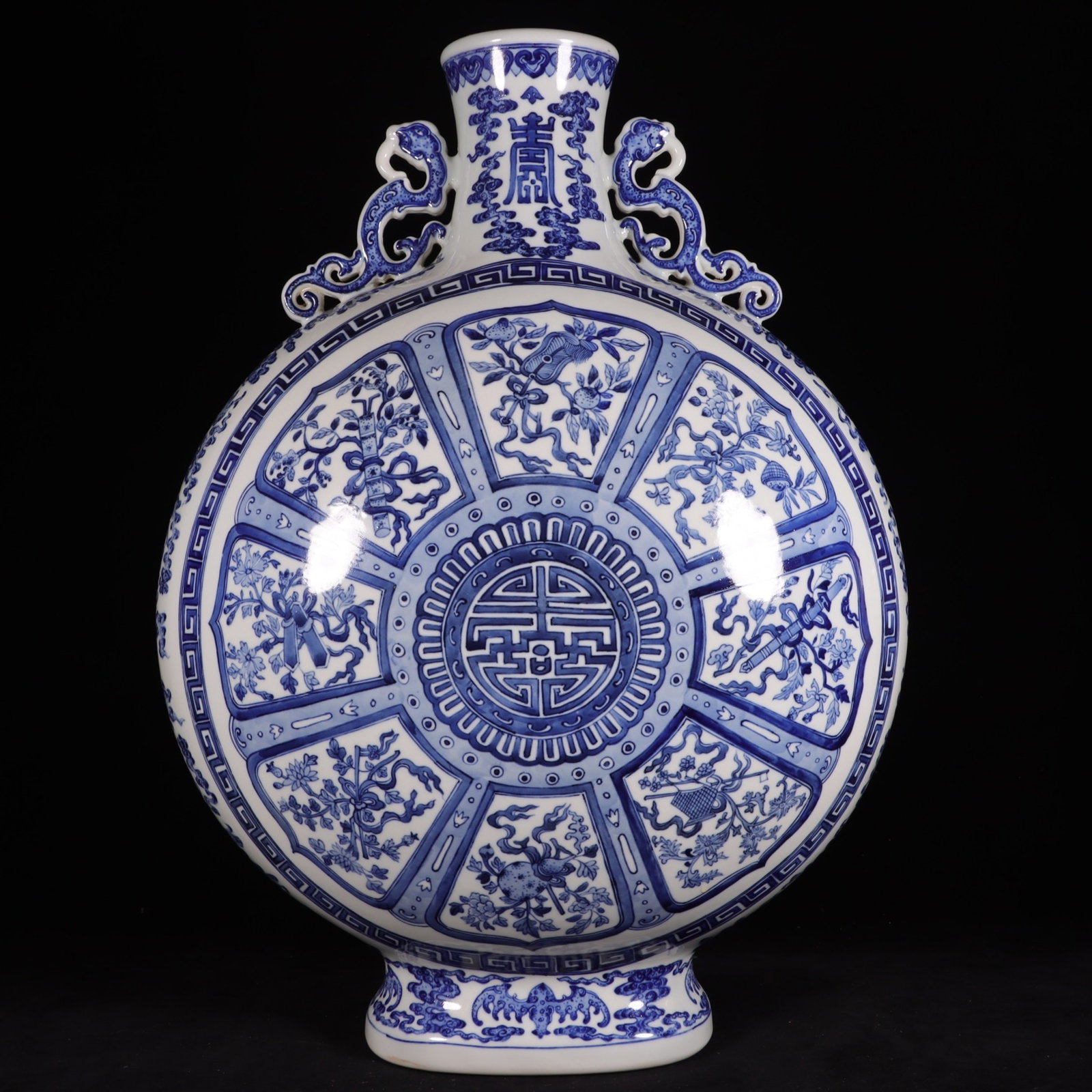A Huge Blue and White Auspicious Cloud,Bats and Eight Treasures Pattern Dragon-Ears Vase: A Huge Blue and White Auspicious Cloud,Bats and Eight Treasures Pattern Dragon-Ears Vase,Qing Dynasty, China,Qianlong Six-character Mark,Size:20.5inx15.4in 青花祥云蝙"