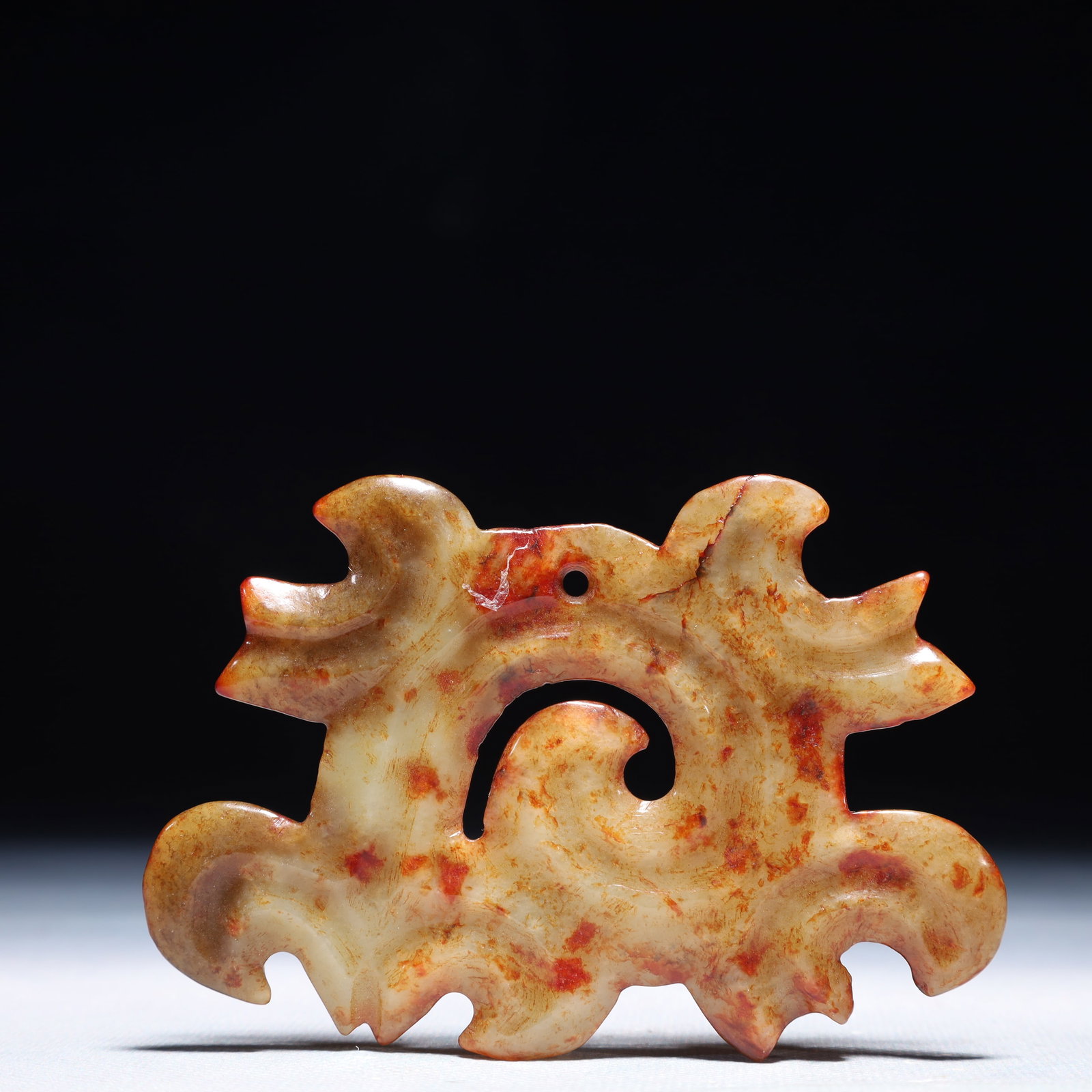 An Archaic Hongshan Culture White Jade Auspicious Cloud Pattern Pendant: An Archaic Hongshan Culture White Jade Auspicious Cloud Pattern Pendant,Ancient Time,China,Size:3.9inx2.6in,Weight:53.7g 红山文化白玉祥云纹挂