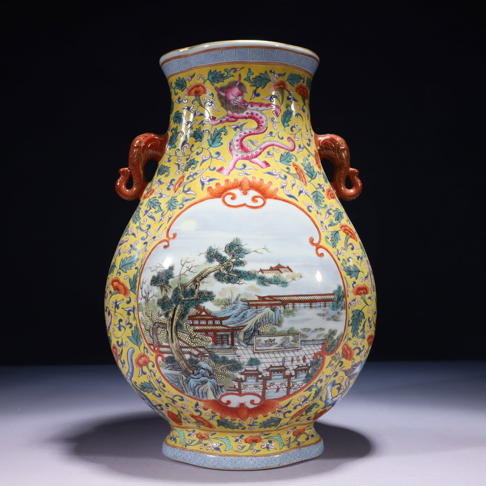 An Exquisite Yellow Ground Famille-Rose Painted Gold Landscape Pattern Double-Ears Vase: An Exquisite Yellow Ground Famille-Rose Painted Gold Landscape Pattern Double-Ears Vase,Qing Dynasty,China,Qianlong Six-character Mark,Size:9.4inx6.7inx15in,Weight:4450g 黄地粉ঊ
