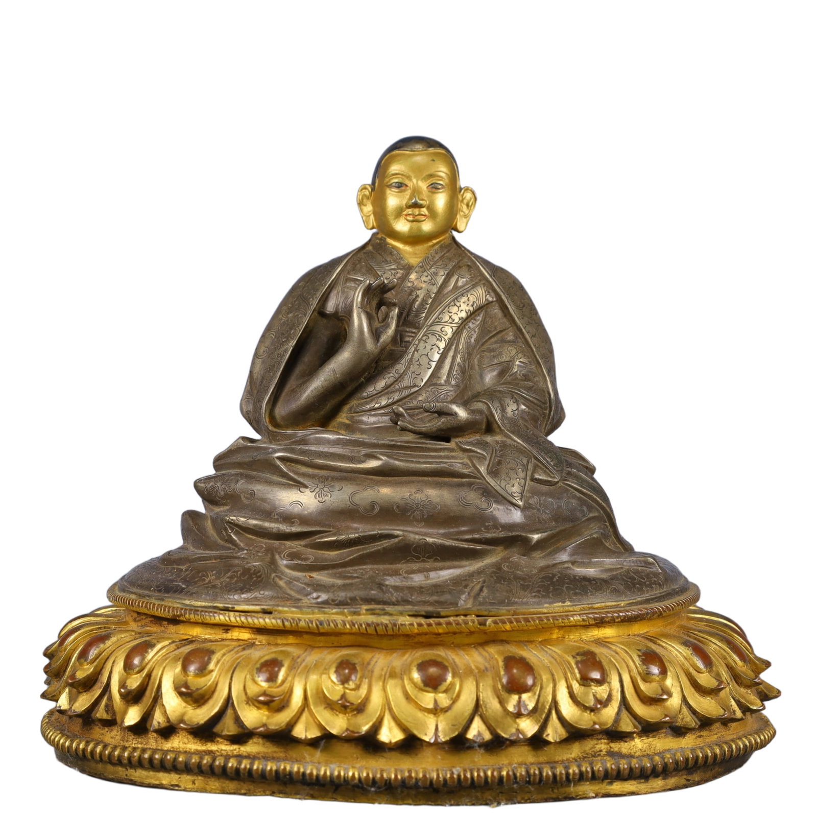 A Solemn Bronze Inlaid Gold and Silver Statue of Guru: A Solemn Bronze Inlaid Gold and Silver Statue of Guru,Qing Dynasty, China,Size:8.3inx7.1inx7.1in,Weight:2800g 铜嵌金银上师像,中国清代