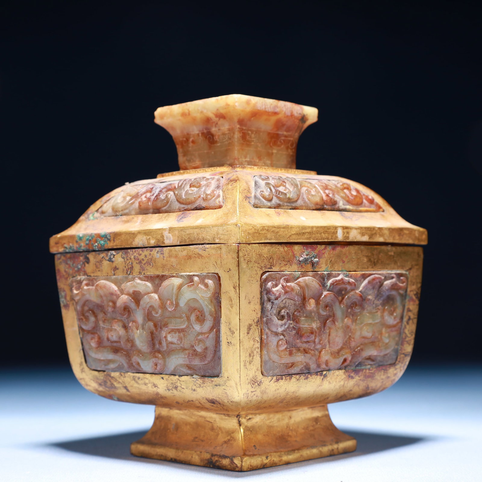 An Exquisite Gilt Bronze Inlaid White Jade Beast-Face Pattern Censer: An Exquisite Gilt Bronze Inlaid White Jade Beast-Face Pattern Censer,the Warring States period in China,Size:4.7inx5.9in,Weight:2100g 铜鎏金嵌白玉兽面&#