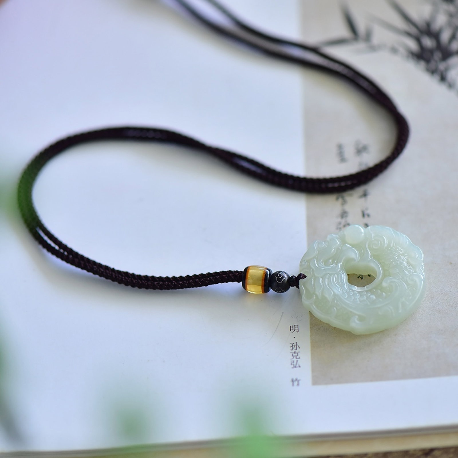 An Exquisite White Jade Dragon Pattern Pendant