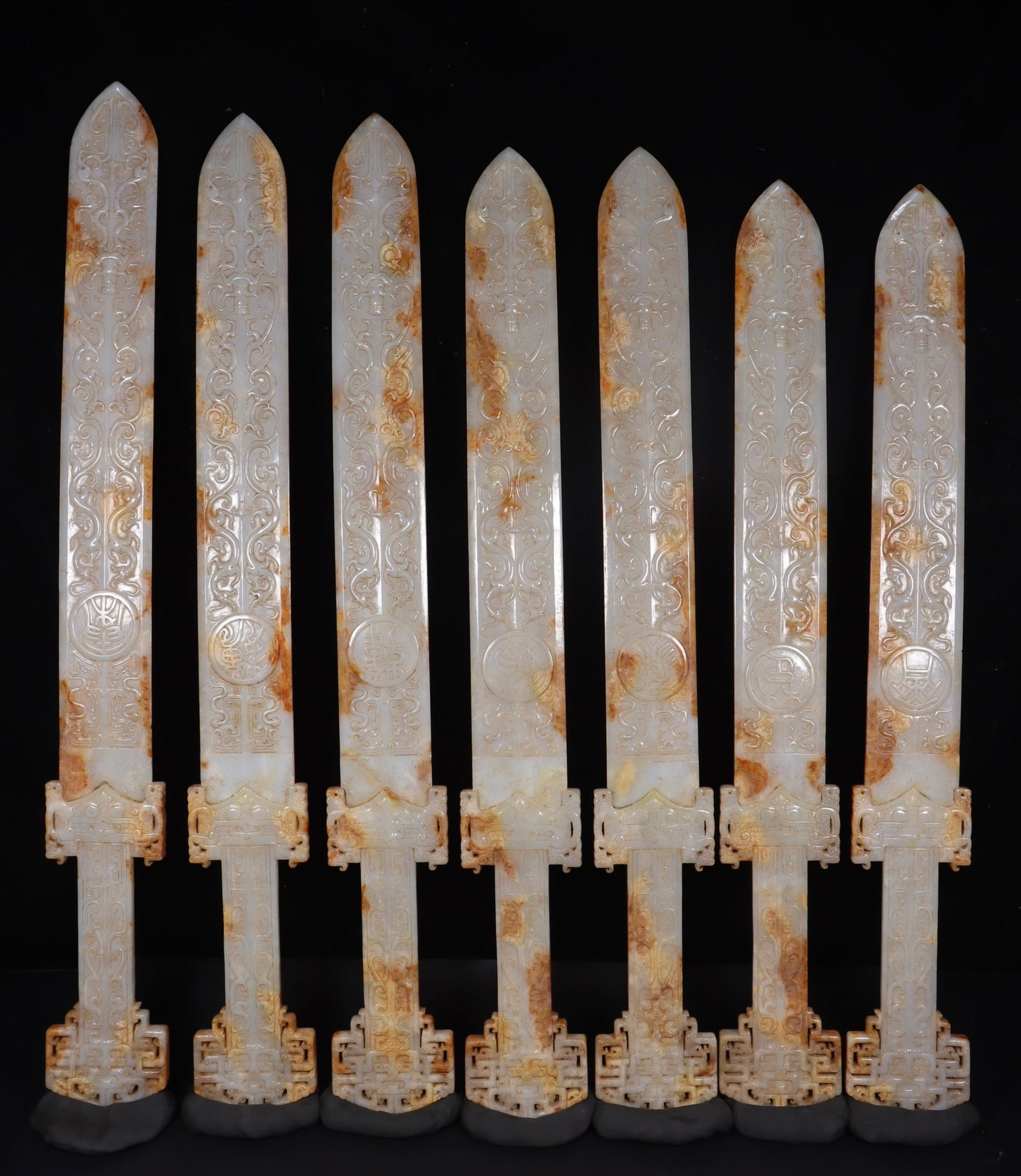 A Set of Fine White Jade Beast Pattern Swords: A Set of Fine White Jade Beast Pattern Swords,the Warring States period in China,Size:30.3inx3.5inx0.6in,Weight:1199g 一套白玉兽纹剑,中国战&
