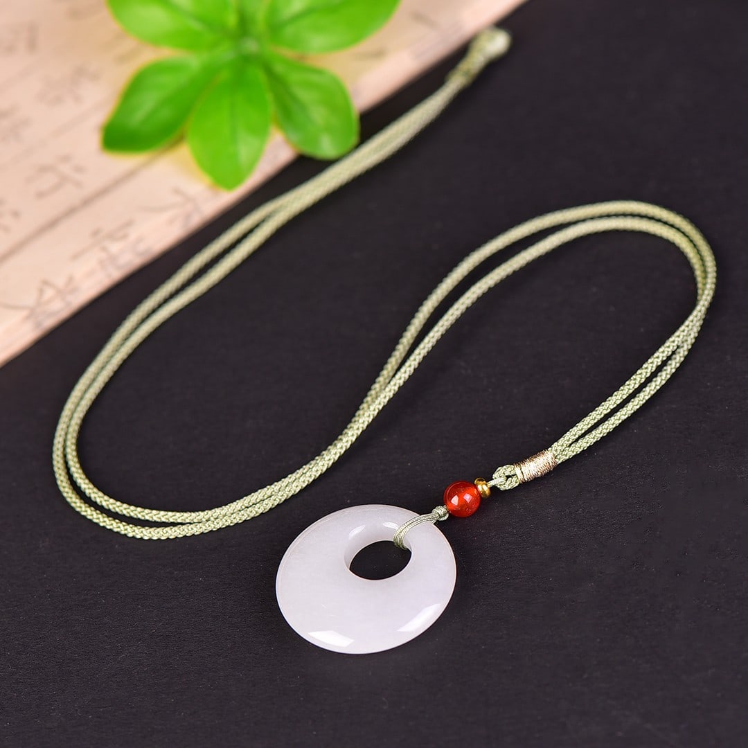 An Exquisite Jadeite Pendant - 6