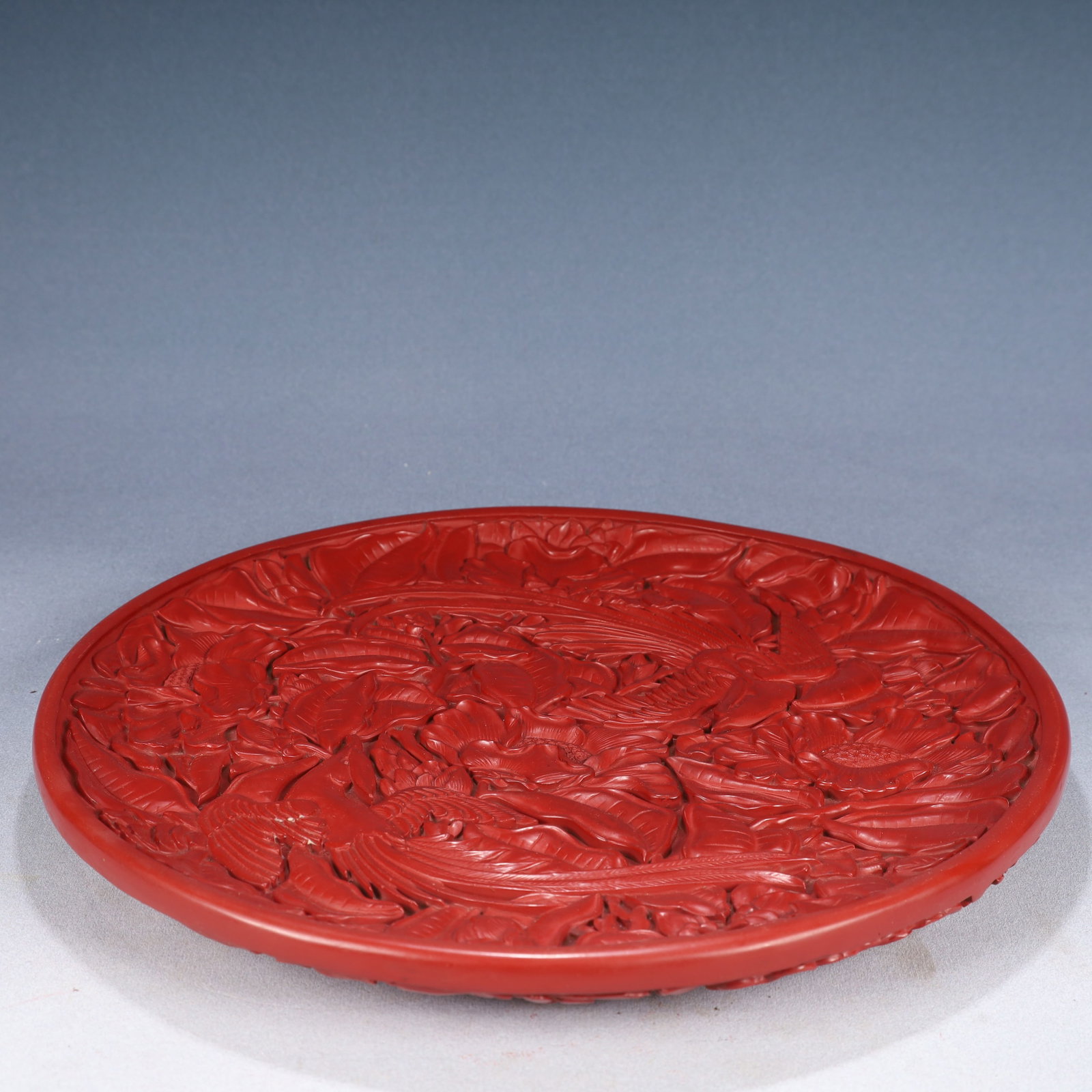 A Rare Carved Red Lacquer Flower and Bird Pattern Plate,With an Imperial Poem by Emperor Qianlong: A Rare Carved Red Lacquer Flower and Bird Pattern Plate,With an Imperial Poem by Emperor Qianlong,Qing Dynasty, China,Size:13.8inx1.4in,Weight:1550g 剔红漆花鸟纹