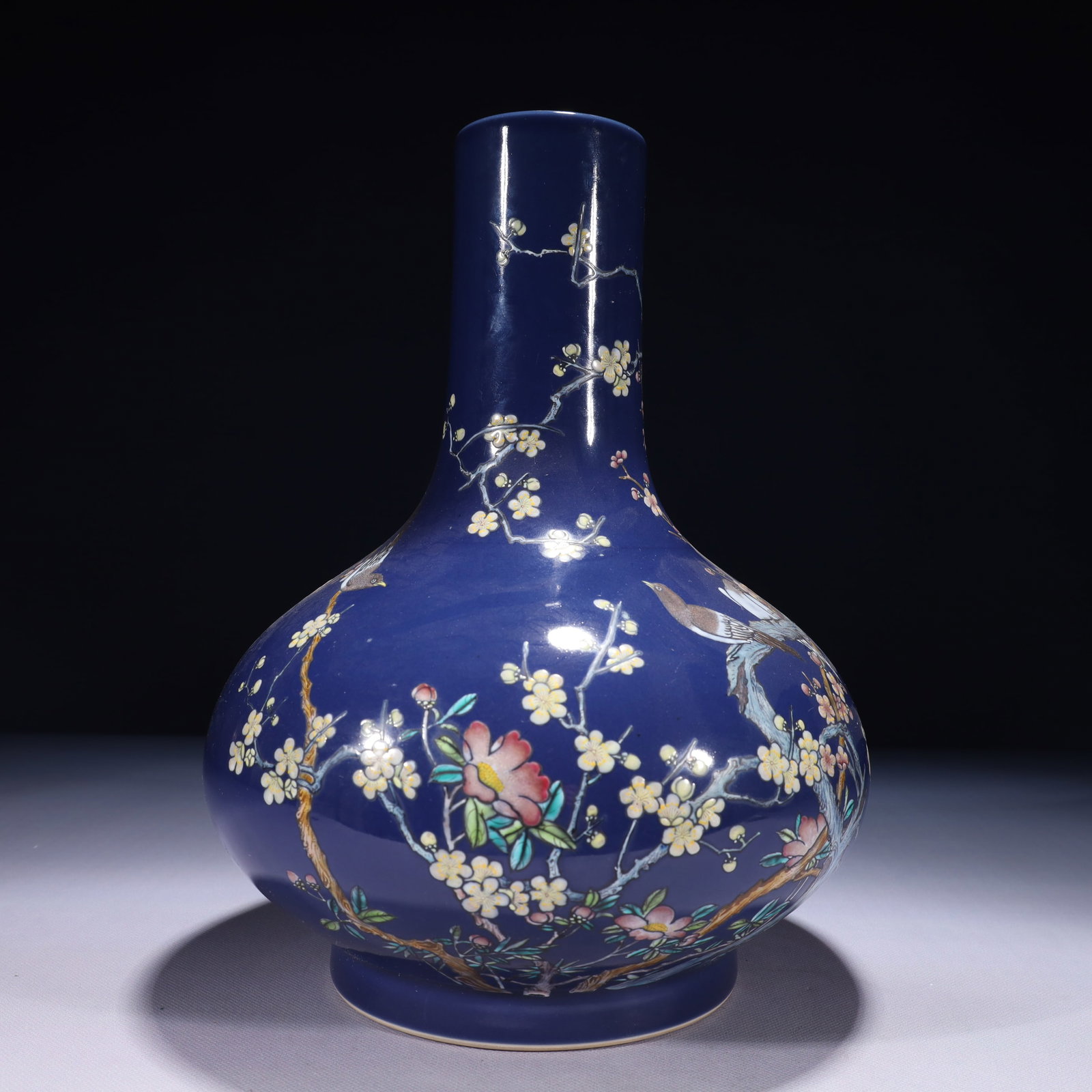 An Exquisite Ji Blue Glazed Famille-Rose Flower and Bird Pattern Vase: An Exquisite Ji Blue Glazed Famille-Rose Flower and Bird Pattern Vase,Qing Dynasty,China,Xuantong Six-character Mark,Size:8.7inx13in,Weight:3200g 霁蓝釉粉彩花࿏