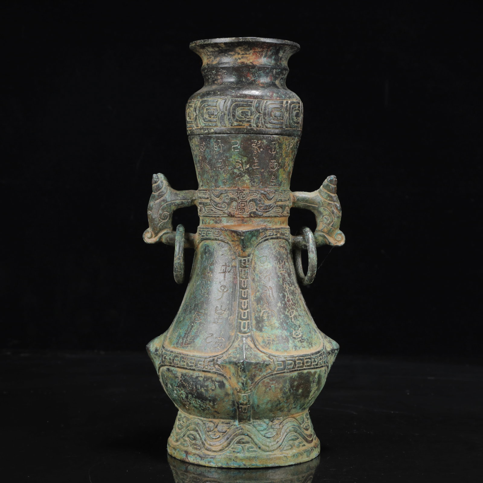 An Archaic Bronze Inscription Beast-Ears Vase: An Archaic Bronze Inscription Beast-Ears Vase,the Warring States Period in China,Size:5.1inx4.3inx9.8in,Weight:1650g 青铜铭文兽耳瓶,中国战&#