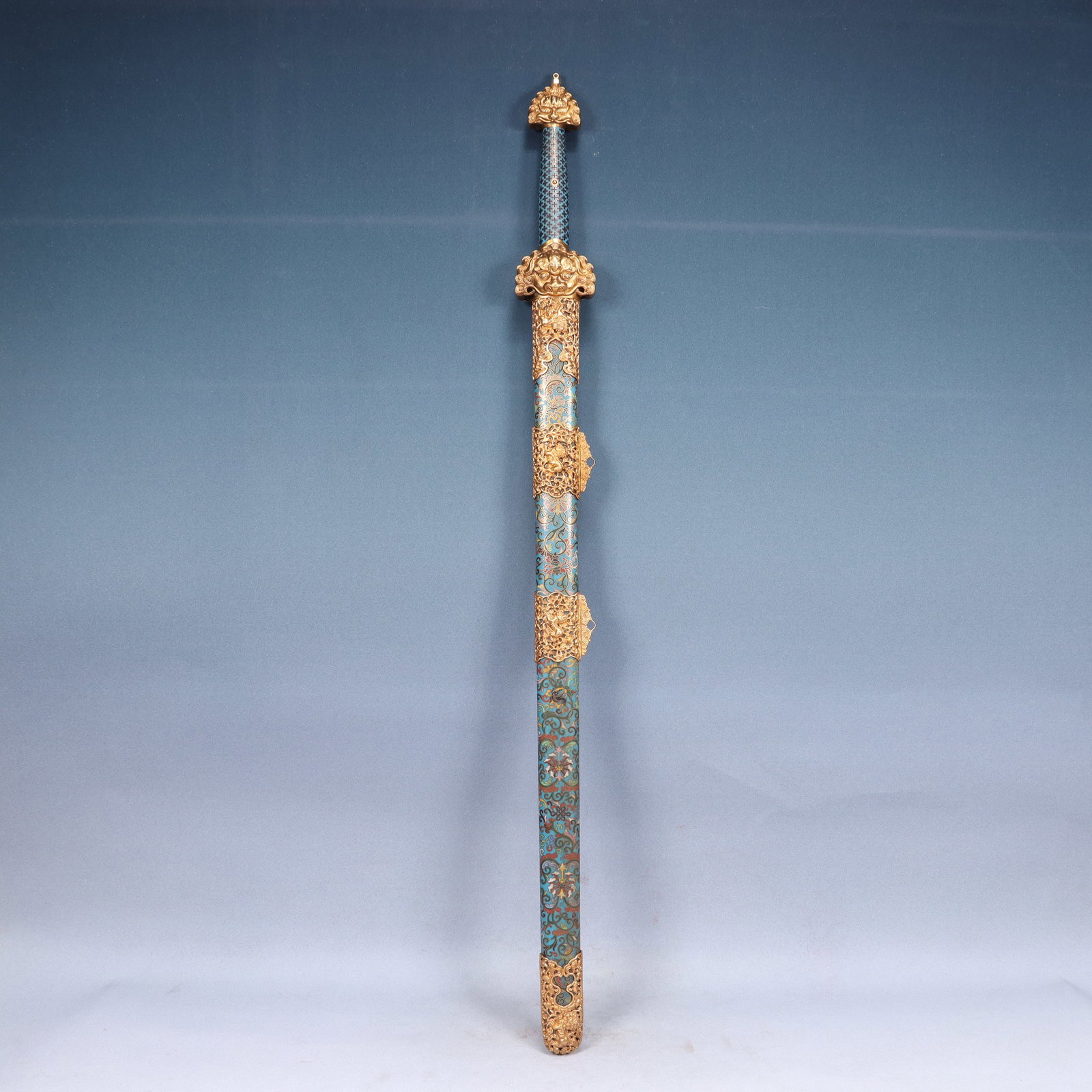 A Huge Cloisonne Lotus and Beast-Face Pattern Sword: A Huge Cloisonne Lotus and Beast-Face Pattern Sword,Qing Dynasty, China,Qianlong Six-character Mark,Size:3.5inx2.8inx42.5in,Weight:2750g 景泰蓝缠枝莲兽面