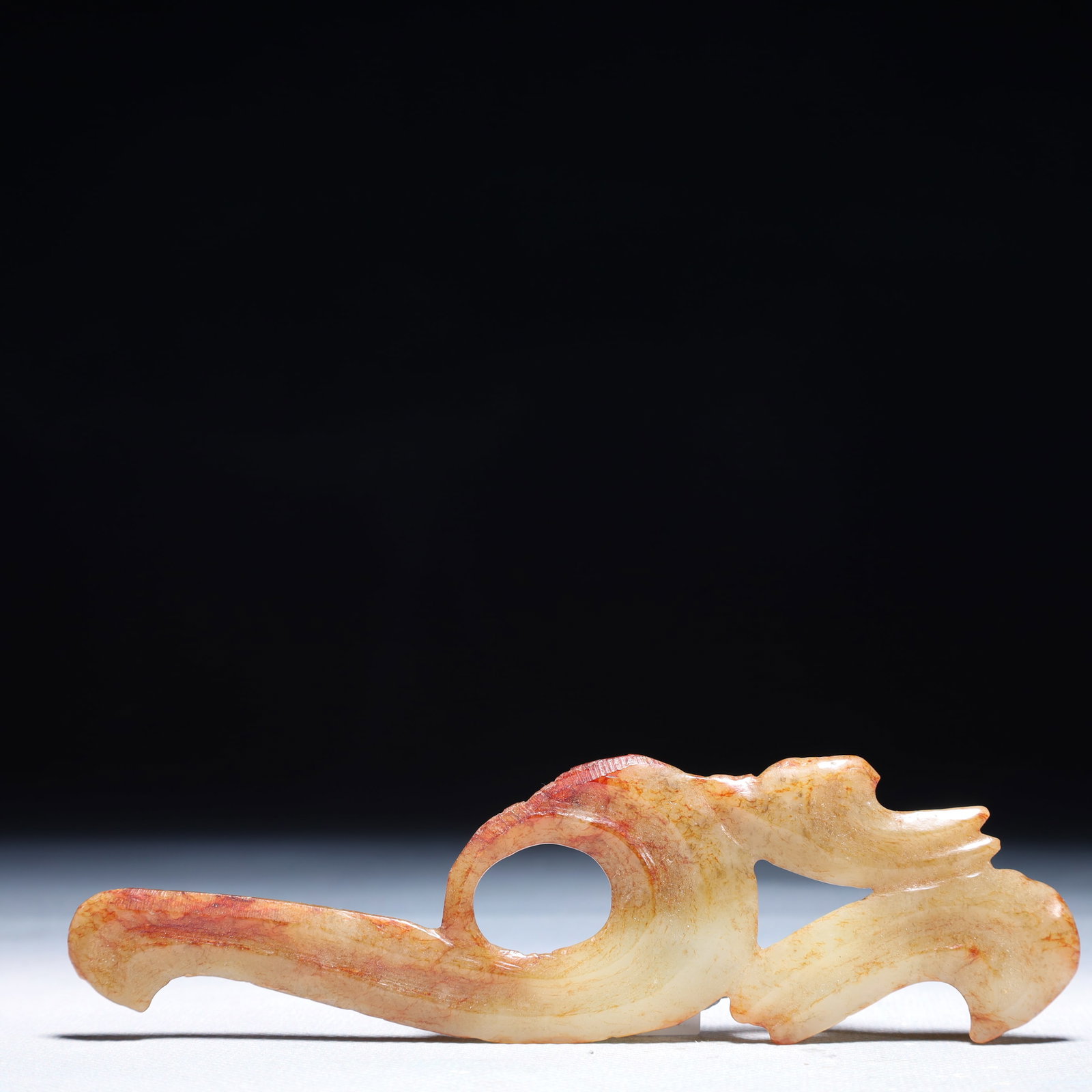 An Archaic Hongshan Culture White Jade Phoenix Pendant: An Archaic Hongshan Culture White Jade Phoenix Pendant,Ancient Time,China,Size:5.5inx1.4in,Weight:33.7g 红山文化白玉凤挂件,中国新