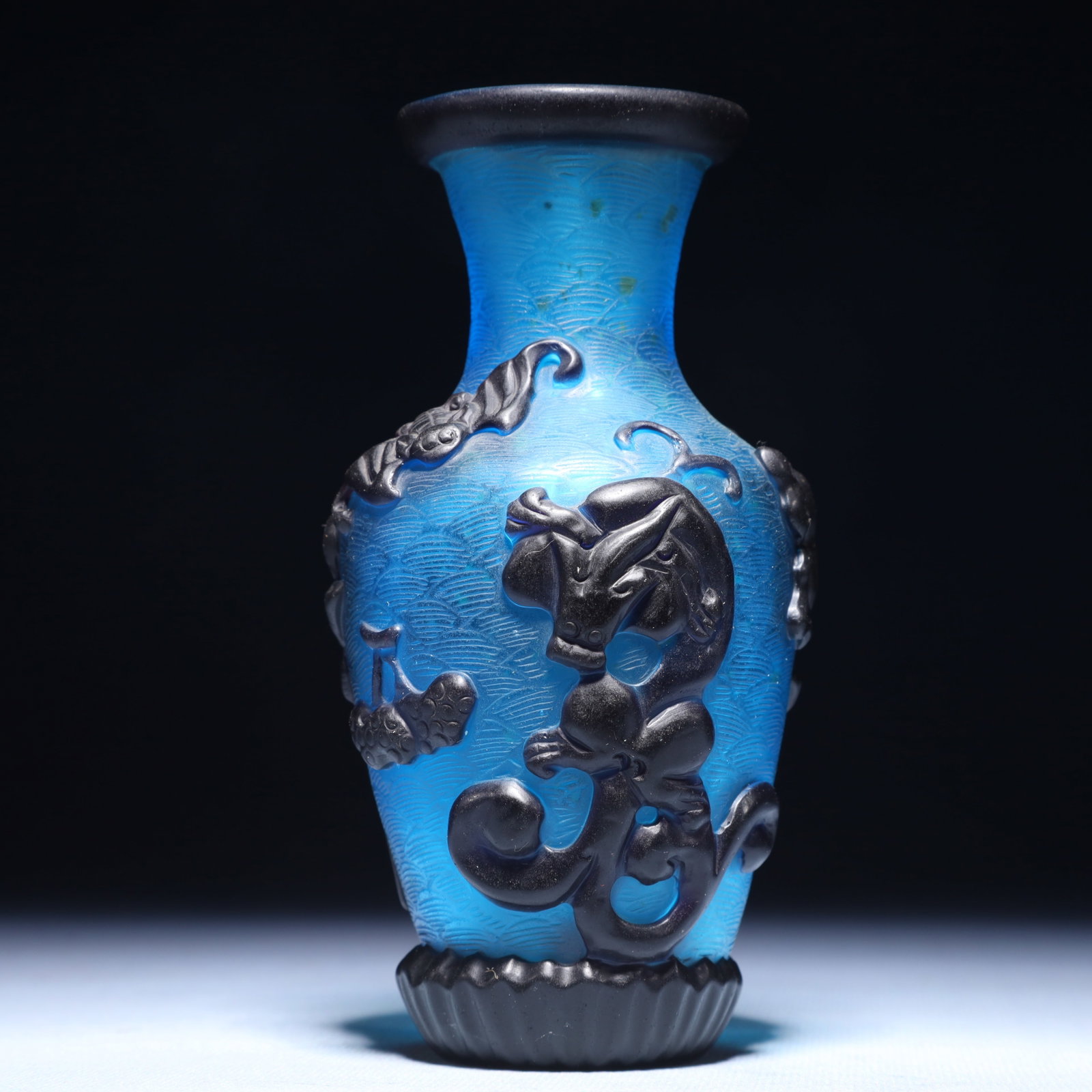 An Exquisite Glass Eight Treasures Pattern Vase: An Exquisite Glass Eight Treasures Pattern Vase,Qing Dynasty,China,Qianlong Four-character Mark,Size:2.8inx5.5in,Weight:250g 琉璃八宝纹瓶,中国清&#