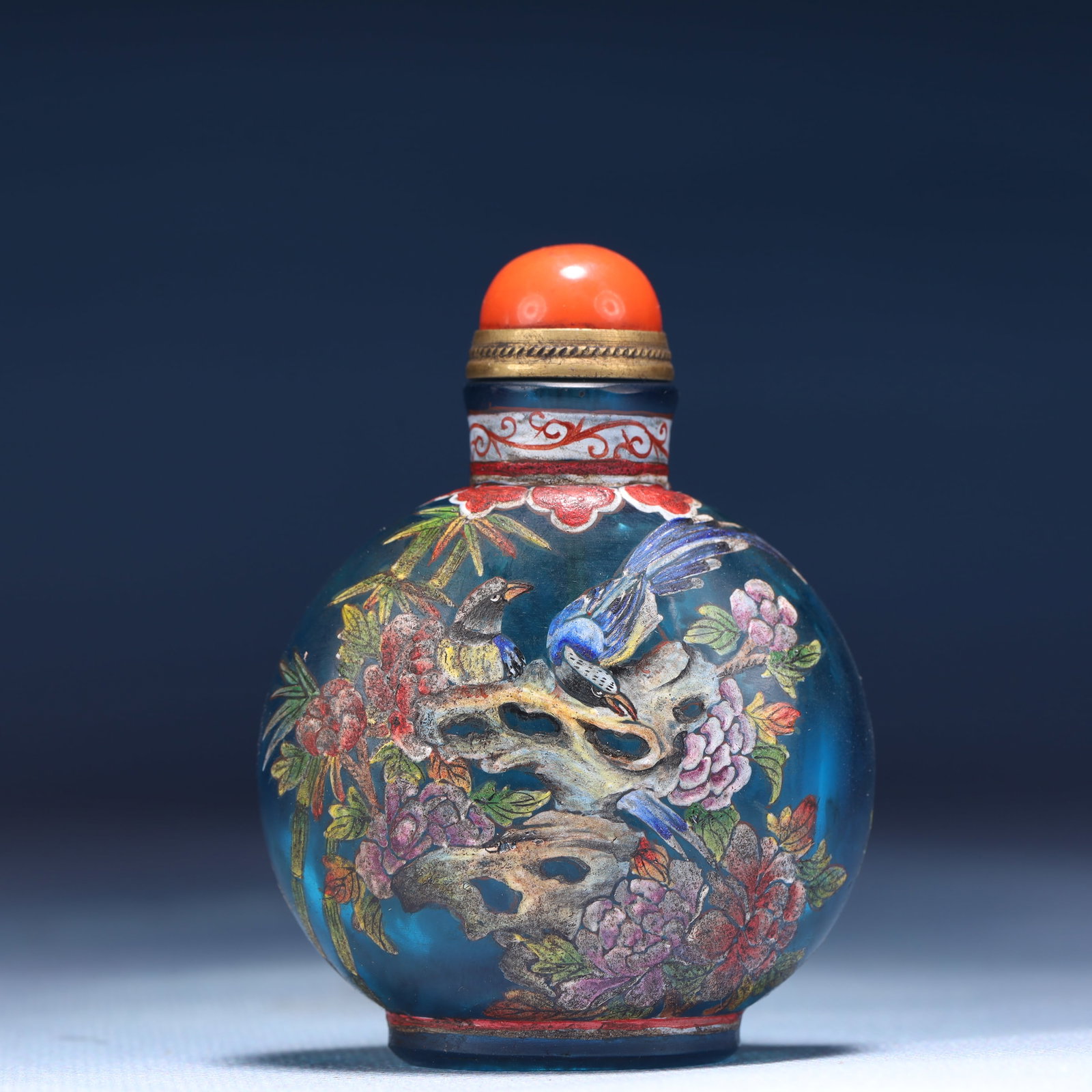 An Exquisite Glass Flower and Bird Pattern Snuff Bottle: An Exquisite Glass Flower and Bird Pattern Snuff Bottle,Qing Dynasty,China,Qianlong Four-character Mark,Size:2.4inx1.2inx2.8in,Weight:68g 琉璃花鸟纹鼻烟ࣥ