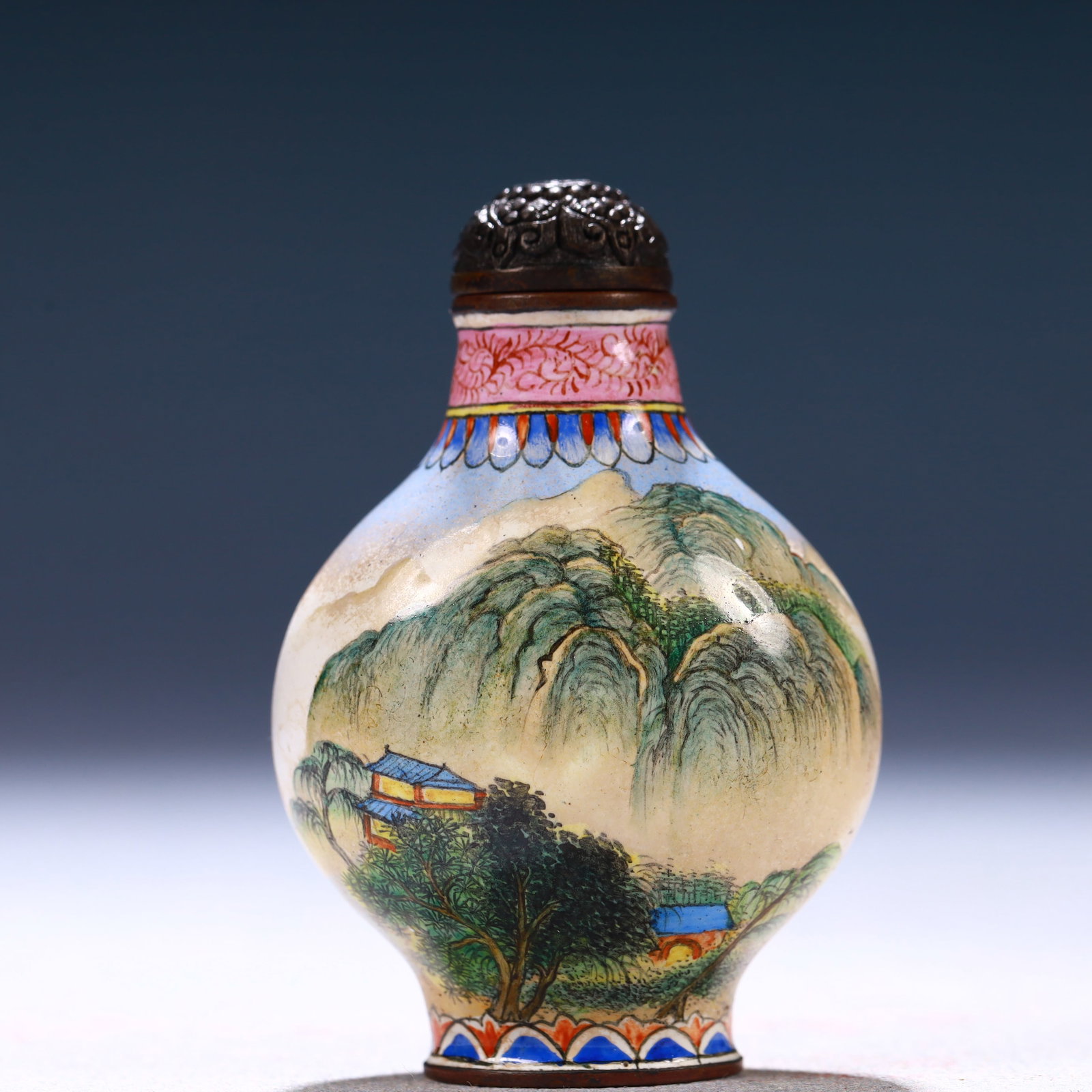 An Exquisite Painted Enamel Landscape Pattern Snuff Bottle: An Exquisite Painted Enamel Landscape Pattern Snuff Bottle,Qing Dynasty, China,Qianlong Four-character Mark,Size:1.6inx0.6inx2.4in,Weight:45g 画珐琅山水纹鼻&#