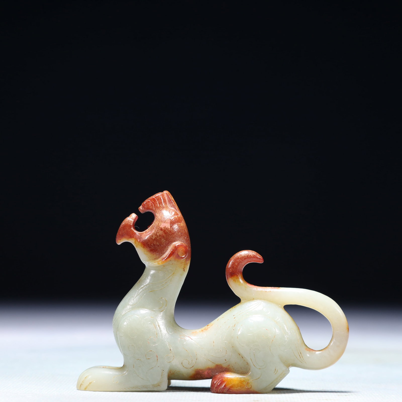 An Exquisite White Jade Beast Ornament: An Exquisite White Jade Beast Ornament,Qing Dynasty,China,Size:3.3inx0.8inx2.6in,Weight:92.8g 白玉兽摆件,中国清代