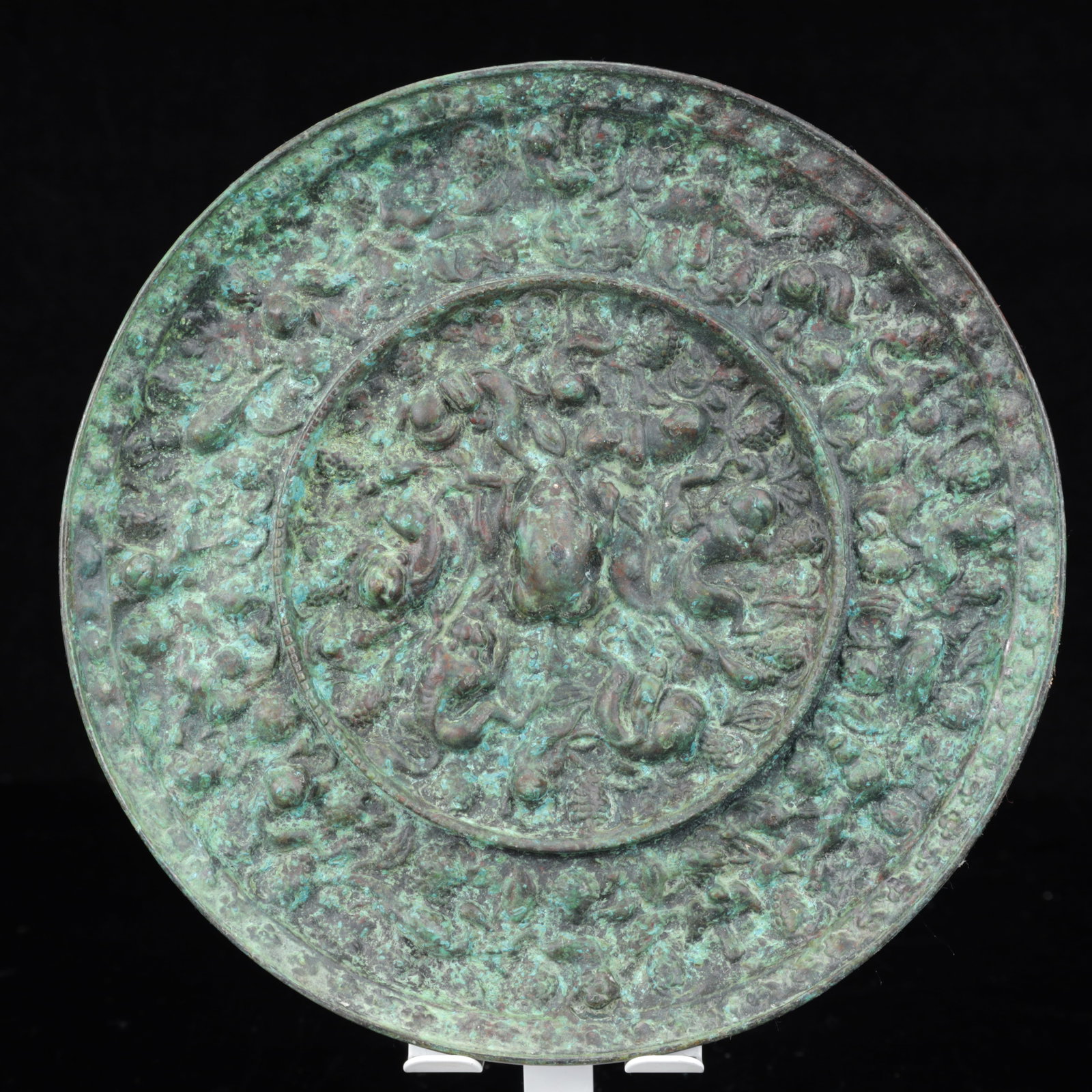 An Archaic Bronze Animal Pattern Round Mirror (1 of 9)