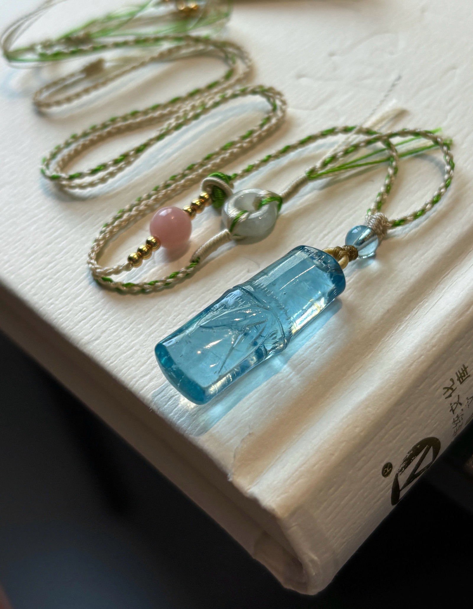 An Exquisite Aquamarine Bamboo Pattern Pendant: An Exquisite Aquamarine Bamboo Pattern Pendant,Size:26mmx10mm,Total Weight:5.8g 海蓝宝竹纹吊坠