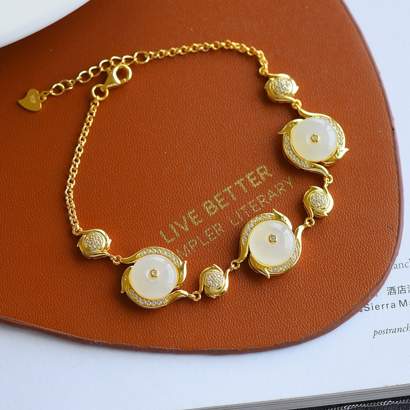 An Exquisite Sterling Silver-Gold Plated Inlaid White Jade Bracelets,Inlaid Diamond: An Exquisite Sterling Silver-Gold Plated Inlaid White Jade Bracelets,Inlaid Diamond,Size:10mmx10mm 纯银镀金镶白玉手链,嵌钻石