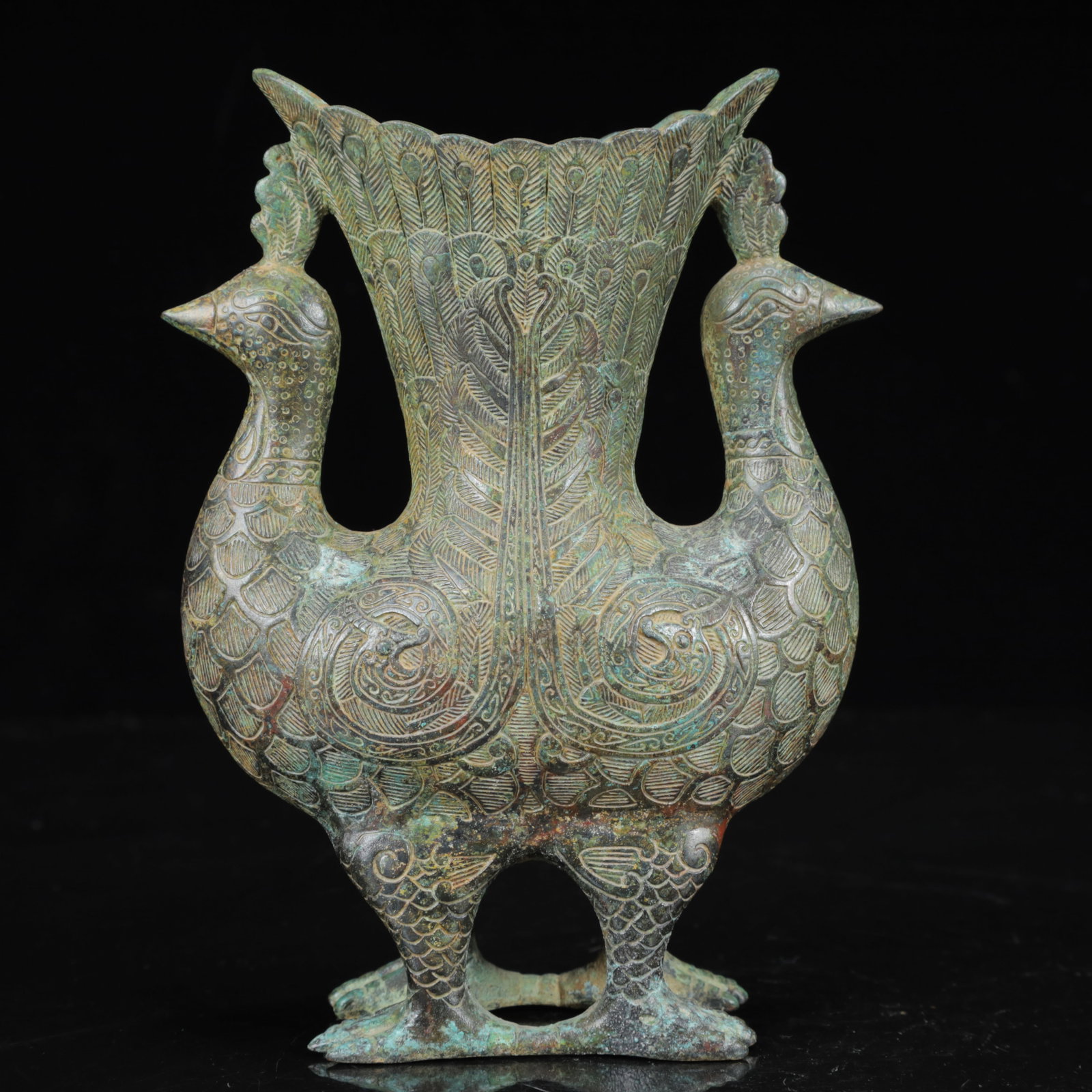An Archaic Bronze Phoenix Pattern Phoenix Cup: An Archaic Bronze Phoenix Pattern Phoenix Cup,the Warring States Period in China,Size:4.7inx1.6inx9.4in,Weight:650g 青铜凤纹凤杯,中国战国