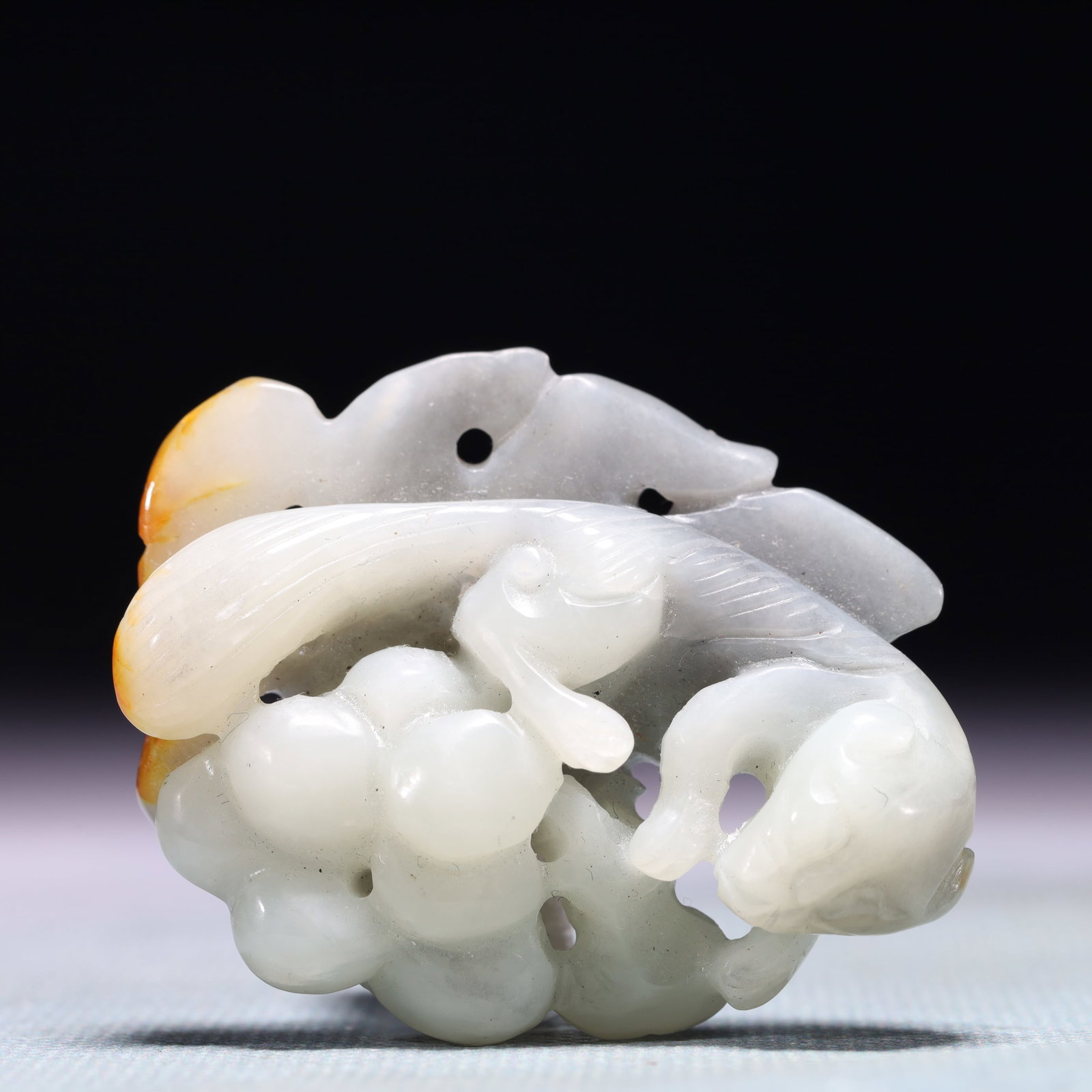 An Exquisite White Jade Squirrel Patten Ornament: An Exquisite White Jade Squirrel Patten Ornament,Qing Dynasty,China,Size:1.6inx2in,Weight:33.4g 白玉松鼠纹摆件,中国清代