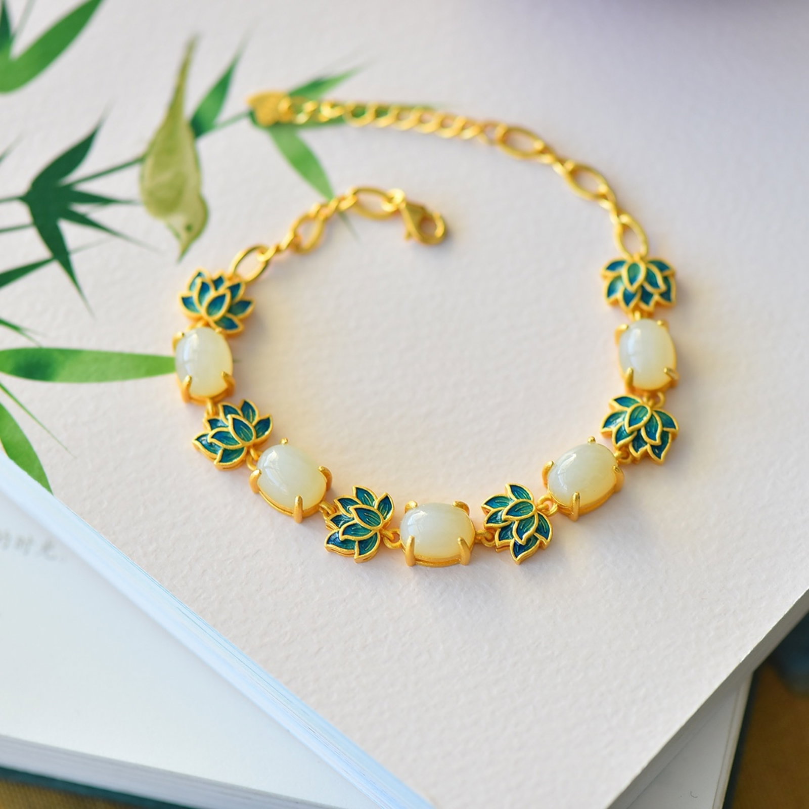 An Exquisite Sterling Silver-Gold Plated Inlaid White Jade Enamel Bracelets: An Exquisite Sterling Silver-Gold Plated Inlaid White Jade Enamel Bracelets 纯银镀金镶白玉珐琅手链