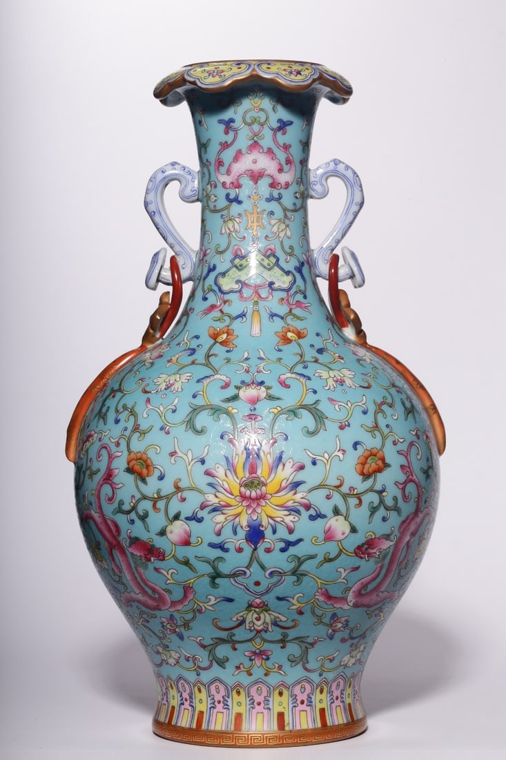 A Exquisite Turquoise-Ground Foreign Enamel Flower Pattern Vase: A Exquisite Turquoise-Ground Foreign Enamel Flower Pattern Vase,Qing Dynasty, China,Jiaqing Six-character Mark,Size:13.4inx7.3inx4.3in 松石绿地洋彩宝相&