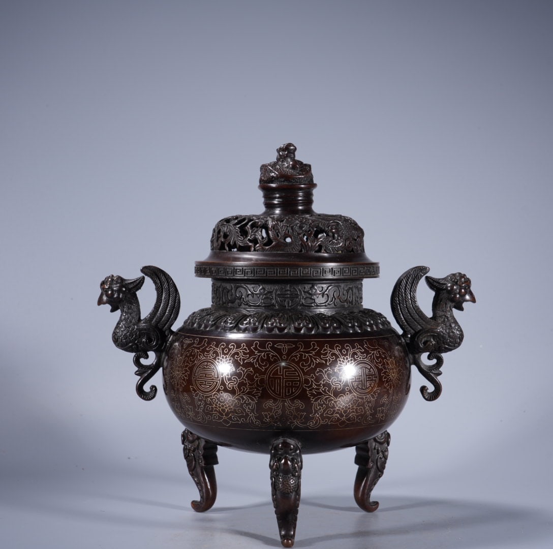 A Exquisite Silver-Inlaid Bronze Phoenix-Ears Tripod Censer: A Exquisite Silver-Inlaid Bronze Phoenix-Ears Tripod Censer,Ming Dynasty, China,With Mark,Size:9.1inx4.6in ,Weight:3955g