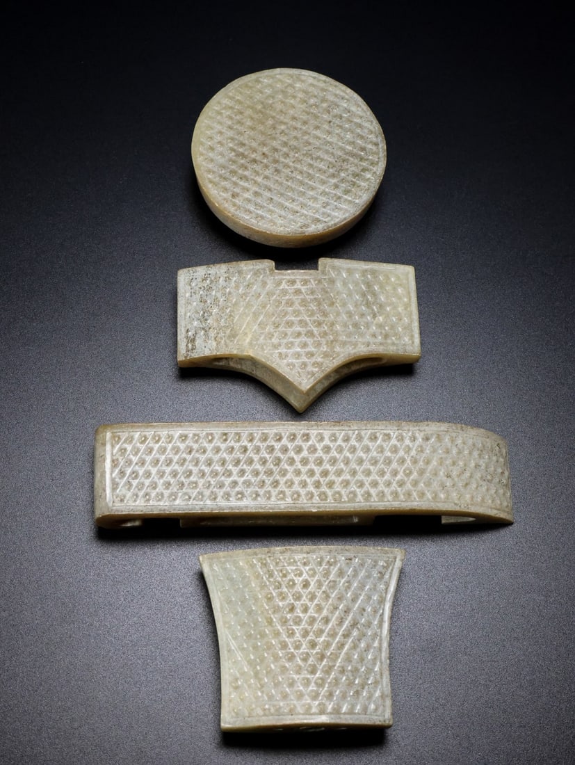 A Set of Exquisite Hotan Jade Sword Ornament: A Set of Exquisite Hotan Jade Sword Ornament,Han Dynasty, China,Size:2.4inx0.8inx2in,Weight:278g 一套和田玉剑饰,中国汉代