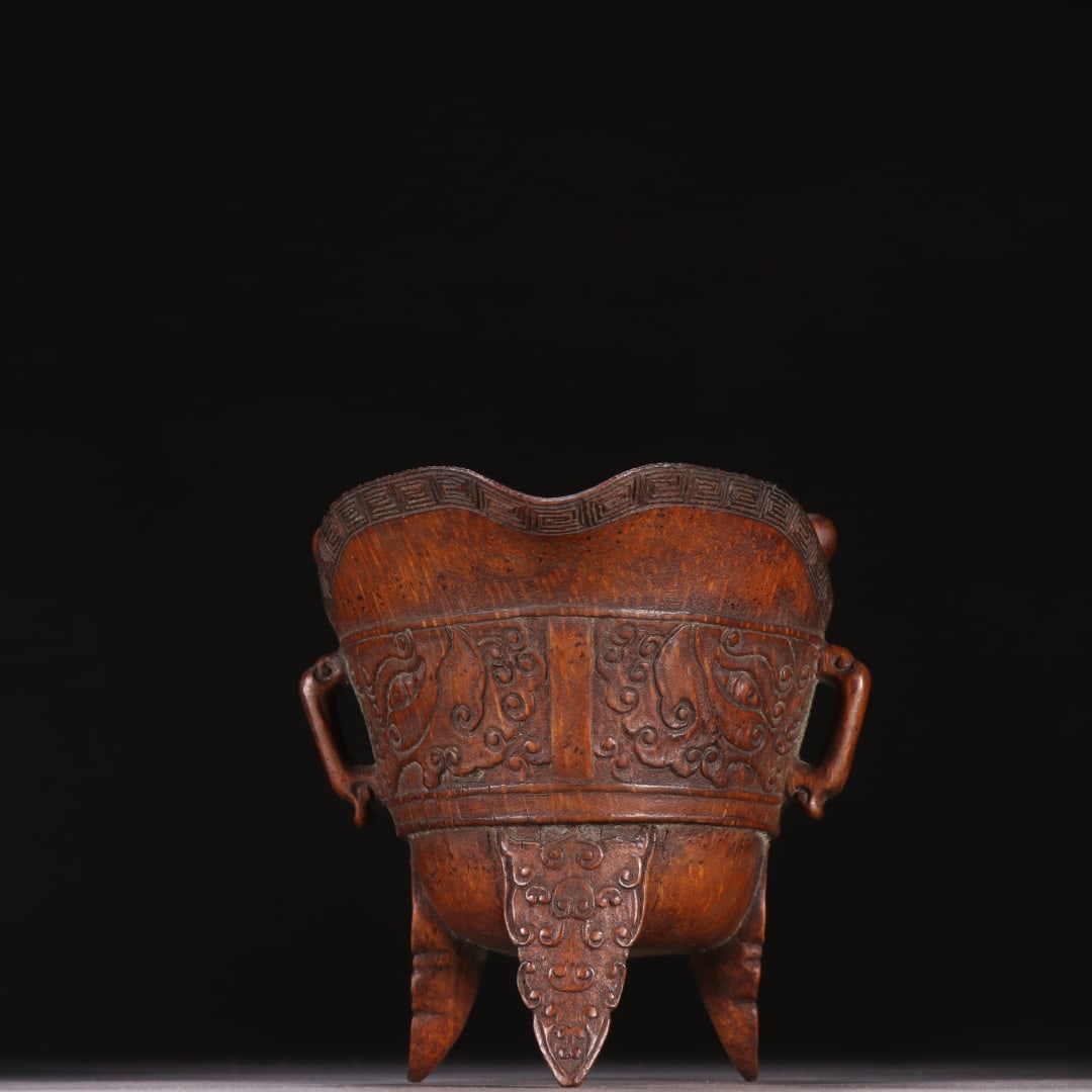 A Exquisite Bamboo Carving Tripod Goblet: An Exquisite Bamboo Carving Tripod Goblet, Qing Dynasty, China,Size:7.5inx4.4in ,Weight:82.1g 竹雕三足爵杯, 中国清代