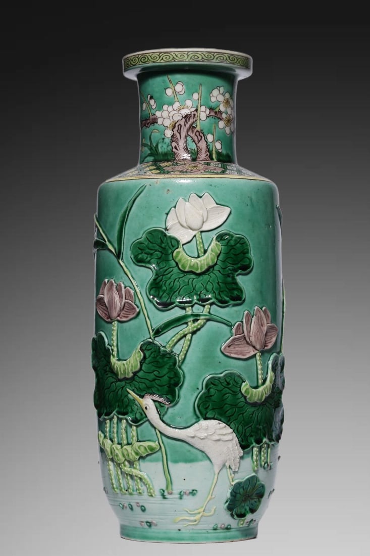 A Exquisite Tri-Color Glazed Flower and Bird Pattern Vase(Restoration): An Exquisite Tri-Color Glazed Flower and Bird Pattern Vase(Restoration),Qing Dynasty, China,Qianlong Six-character Mark,Size:11.4inx4.7in,Weight:824g 三彩花鸟纹瓶(&
