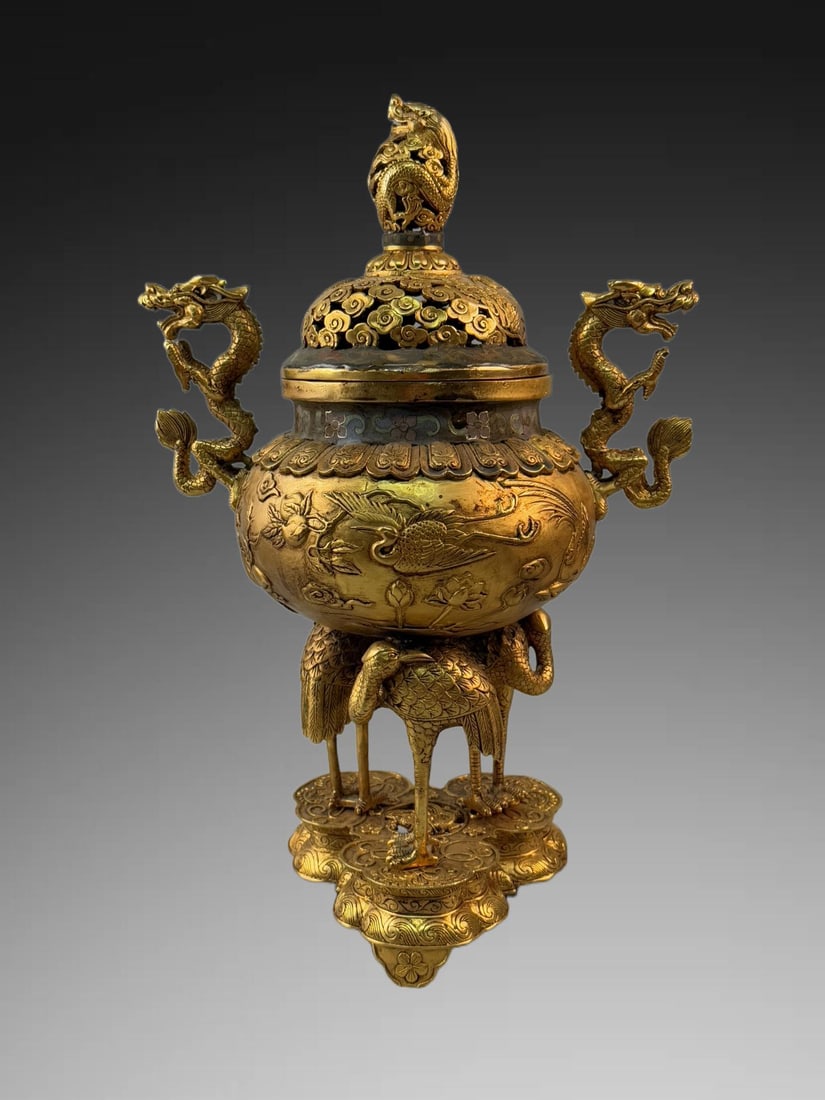 A Exquisite Gilt Bronze Dragon-Ears Censer: A Exquisite Gilt Bronze Dragon-Ears Censer,Ming Dynasty, China,Xuande Four-character Mark,Size:16.9inx10.6in ,Weight:5355g 铜鎏金龙耳炉,中国明
