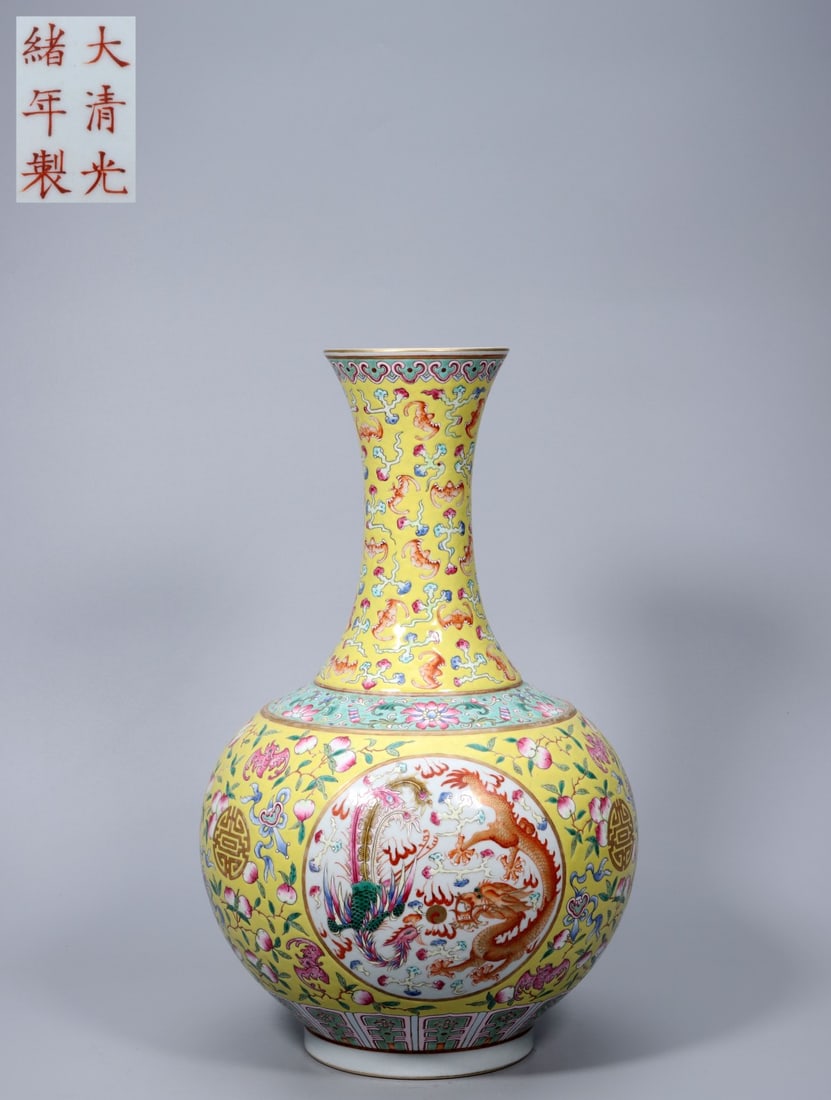 A Exquisite Yellow Ground Dragon and Phoenix Vase: A Exquisite Yellow Ground Dragon and Phoenix Vase,Qing Dynasty, China,Guangxu Six-character Mark,Size:15.6inx9.6inx4in ,Weight:2497g 黄地龙凤瓶,中国清&#