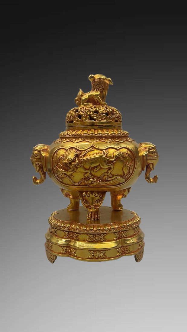 A Exquisite Gilt Bronze Lion Pattern Elephant-Ears Censer: A Exquisite Gilt Bronze Lion Pattern Elephant-Ears Censer,Qing Dynasty, China,With Mark,Size:8.5in,Weight:1225g