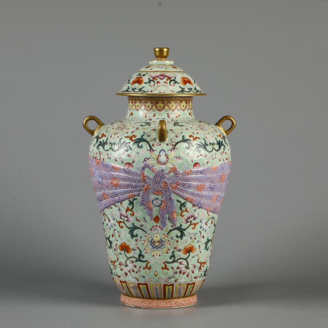 A Exquisite Green Glazed Lotus Pattern Vase: A Exquisite Green Glazed Lotus Pattern Vase,Qing Dynasty, China,Qianlong Six-character Mark,Size:12.6inx7.1in 绿釉缠枝莲纹瓶,中国清代,