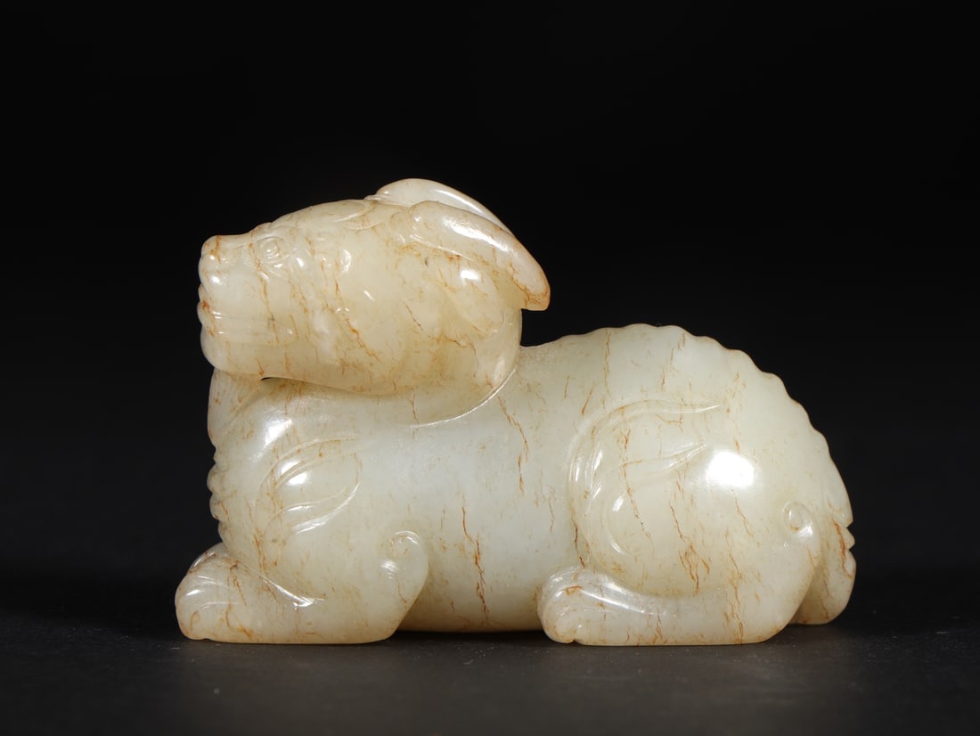 A Exquisite Hotan Jade Auspicious Beast Ornament: A Exquisite Hotan Jade Auspicious Beast Ornament, Qing Dynasty, China,Size:2.8inx1.9in ,Weight:140g 和田玉瑞兽摆件, 中国清代