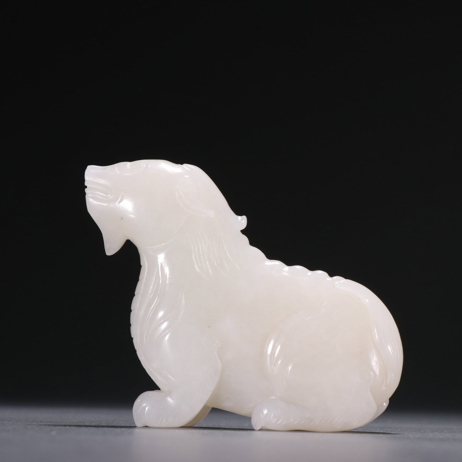 A Exquisite Hotan Jade Auspicious Beast Ornament: A Exquisite Hotan Jade Auspicious Beast Ornament, Qing Dynasty, China,Size:2.4inx3in ,Weight:98g 和田玉瑞兽摆件, 中国清代