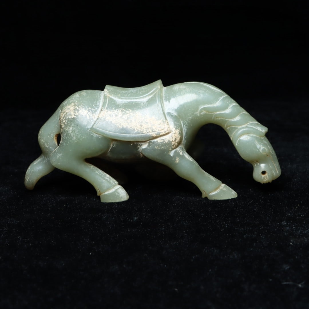 A Exquisite Hotan Jade Horse Ornament: An Exquisite Hotan Jade Horse Ornament,Qing Dynasty, China,Size:5.4inx2.4inx1.7in,Weight:331.2g 和田玉马摆件,中国清代