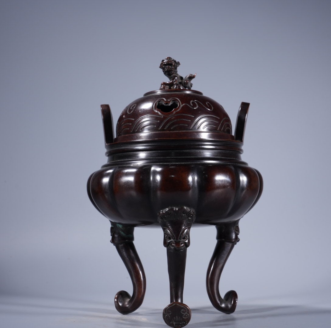 A Exquisite Bronze Double-Ears and Tripod Censer: A Exquisite Bronze Double-Ears and Tripod Censer,Ming Dynasty, China,Xuande Six-character Mark,Size:9.1inx4.8in ,Weight:3320g 紫铜双耳三足炉,中国&