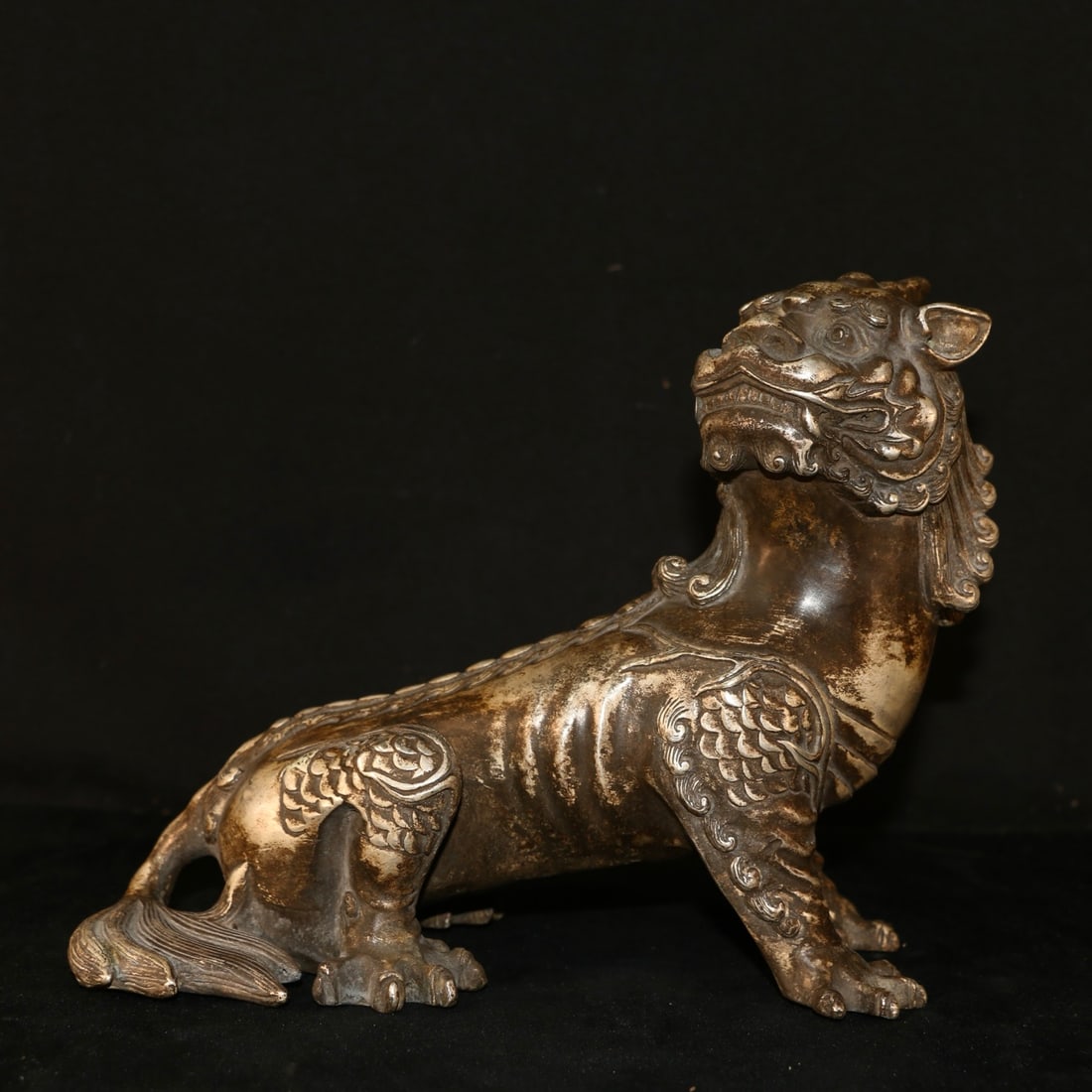 A Exquisite Silver-Gilt Copper Auspicious Beast Ornament: A Exquisite Silver-Gilt Copper Auspicious Beast Ornament,Qing Dynasty, China,Size:8.7inx7.5in ,Weight:2047g 铜鎏银瑞兽摆件,中国清代