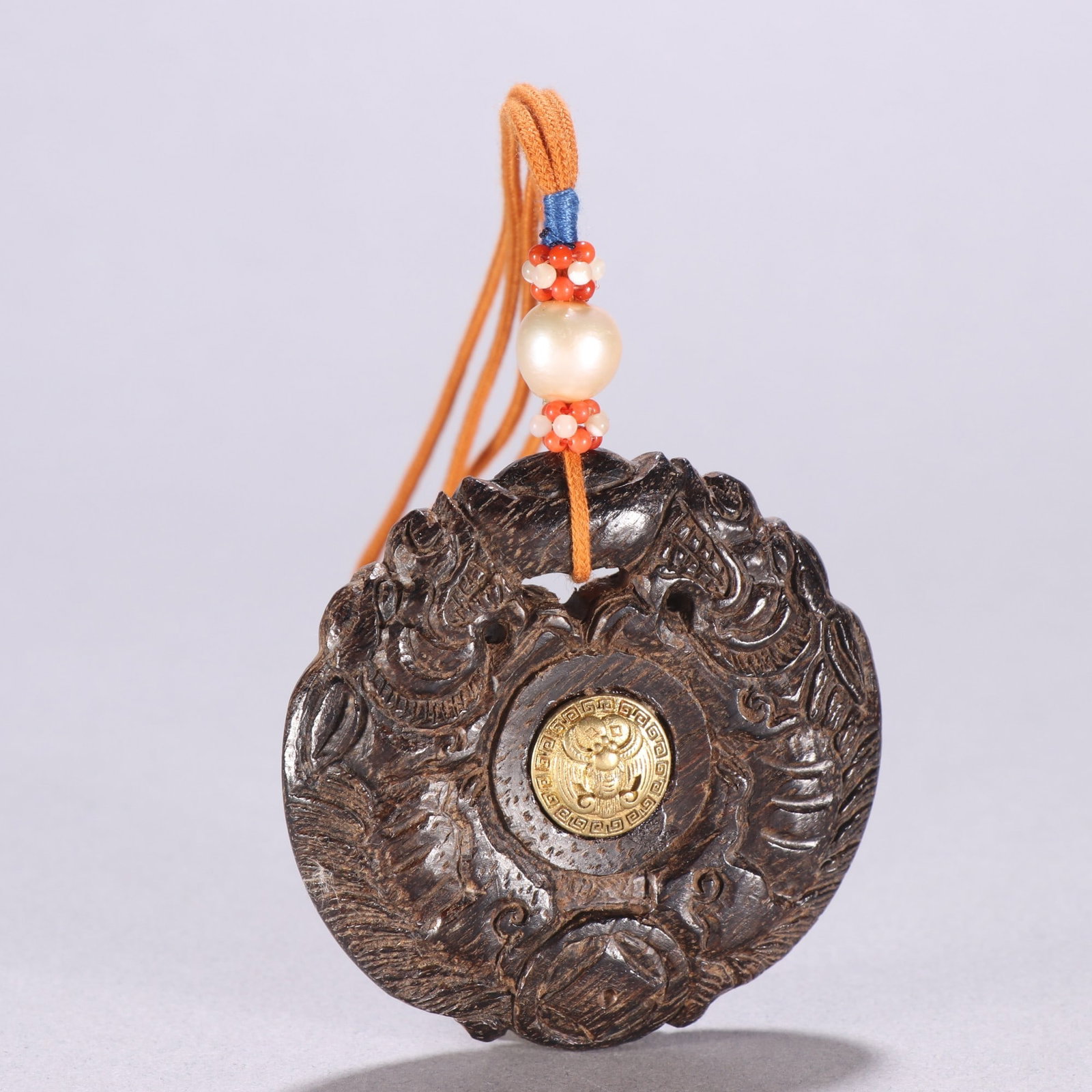 A Exquisite Eaglewood Auspicious Beast Pendant: A Exquisite Eaglewood Auspicious Beast Pendant,Qing Dynasty, China,Size:2.2inx2.2in,Weight:25.2g 沉香瑞兽挂件,中国清代