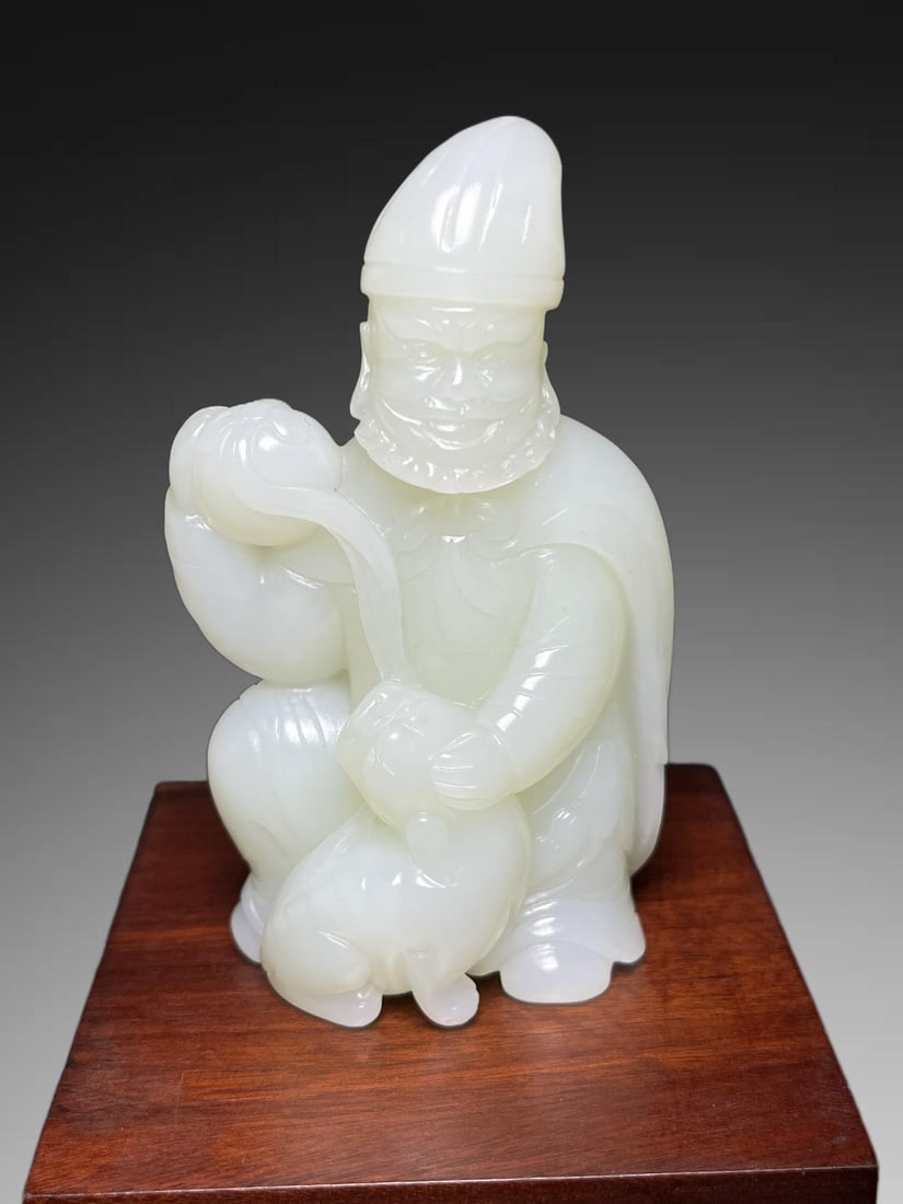 A Exquisite Hotan Jade Figures Handheld Carving: A Exquisite Hotan Jade Figures Handheld Carving,Qing Dynasty, China,Size:2inx1.1inx3.6in,Weight:150g 和田玉人手把件,中国清代