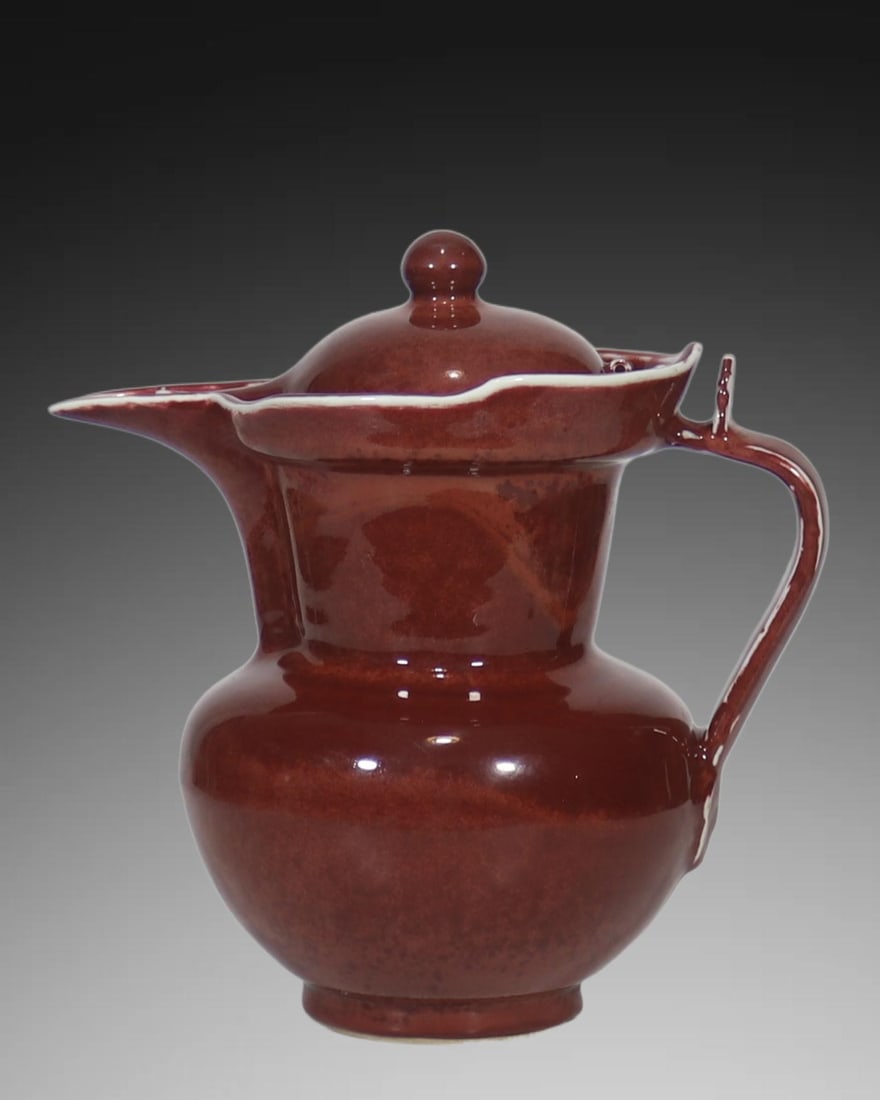A Exquisite Gem Red Glaze Monk's Cap Ewer: A Exquisite Gem Red Glaze Monk's Cap Ewer,Ming Dynasty, China,Xuande Six-character Mark,Size:9.5in 宝石红釉僧帽壶,中国明代,宣