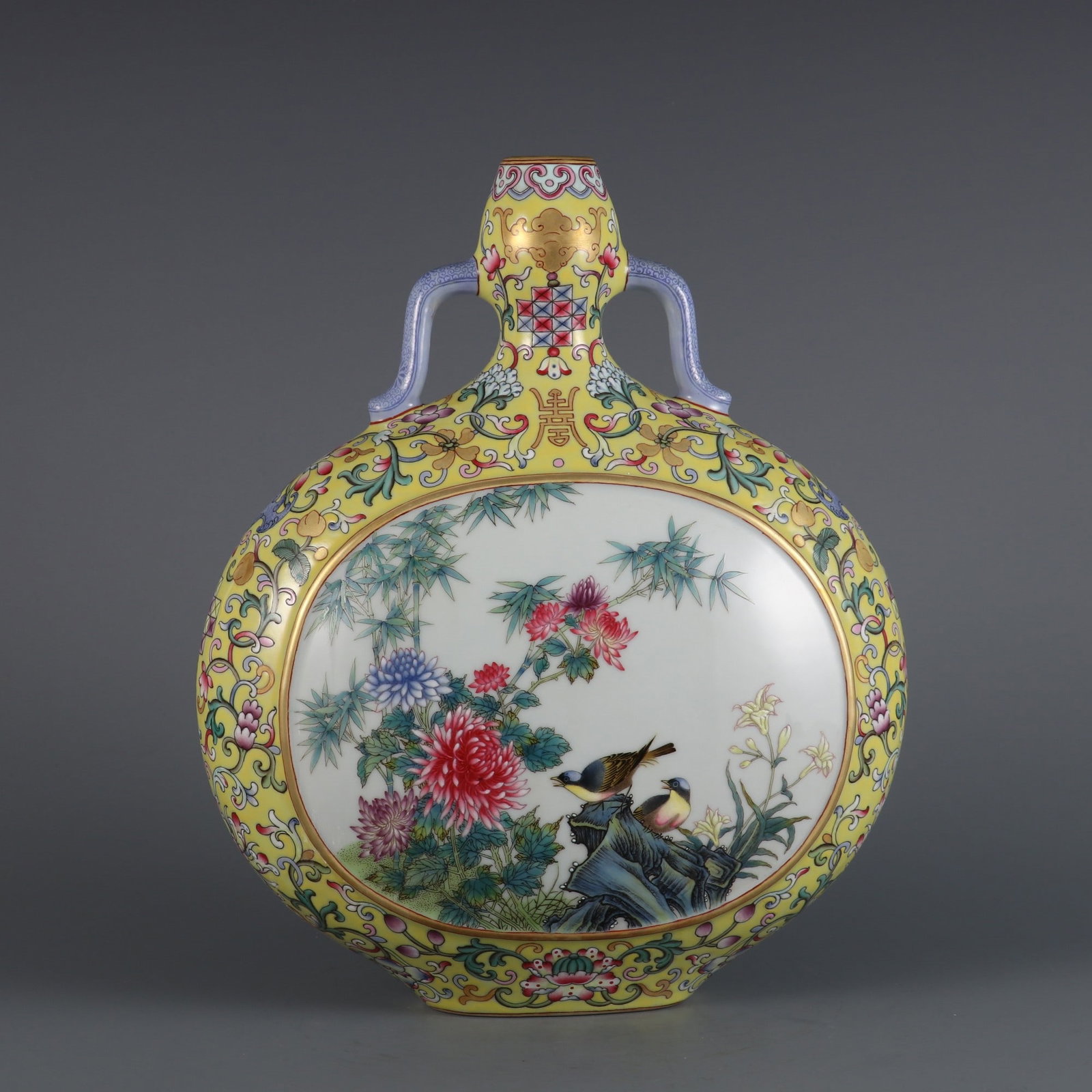 A Exquisite Yellow Ground Famille-Rose Flower and Bird Pattern Vase: A Exquisite Yellow Ground Famille-Rose Flower and Bird Pattern Vase,Qing Dynasty, China,Qianlong Six-character Mark,Size:11.3inx9.1in