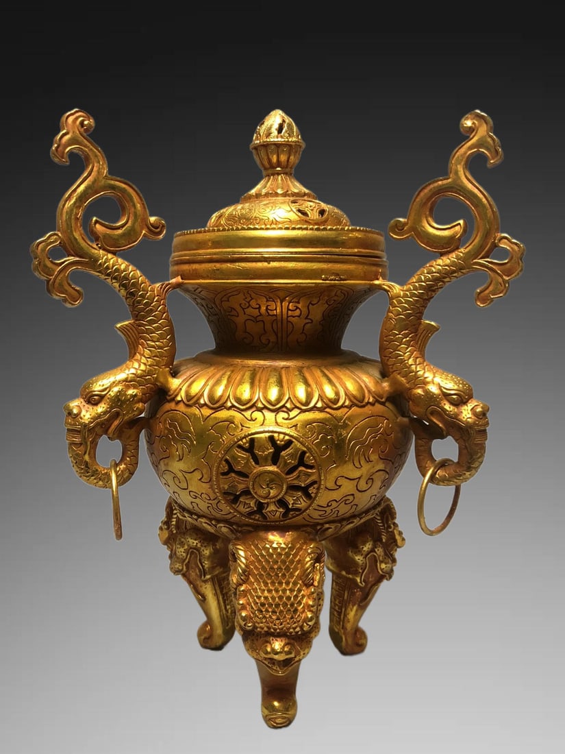 A Exquisite Gilt Bronze Dragon-Ears Censer: A Exquisite Gilt Bronze Dragon-Ears Censer,Qing Dynasty, China,Size:12.2inx4.5inx7.5in,Weight:3000g 铜鎏金龙耳炉,中国清代