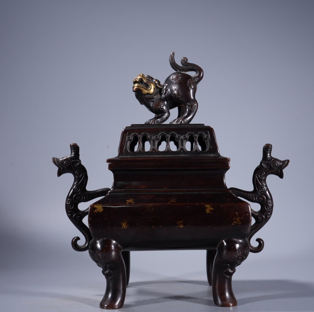 A Exquisite Gilt Bronze Double-Ears Censer: A Exquisite Gilt Bronze Double-Ears Censer,Ming Dynasty, China,Xuande Six-character Mark,Size:9.4inx4.1in ,Weight:4490g