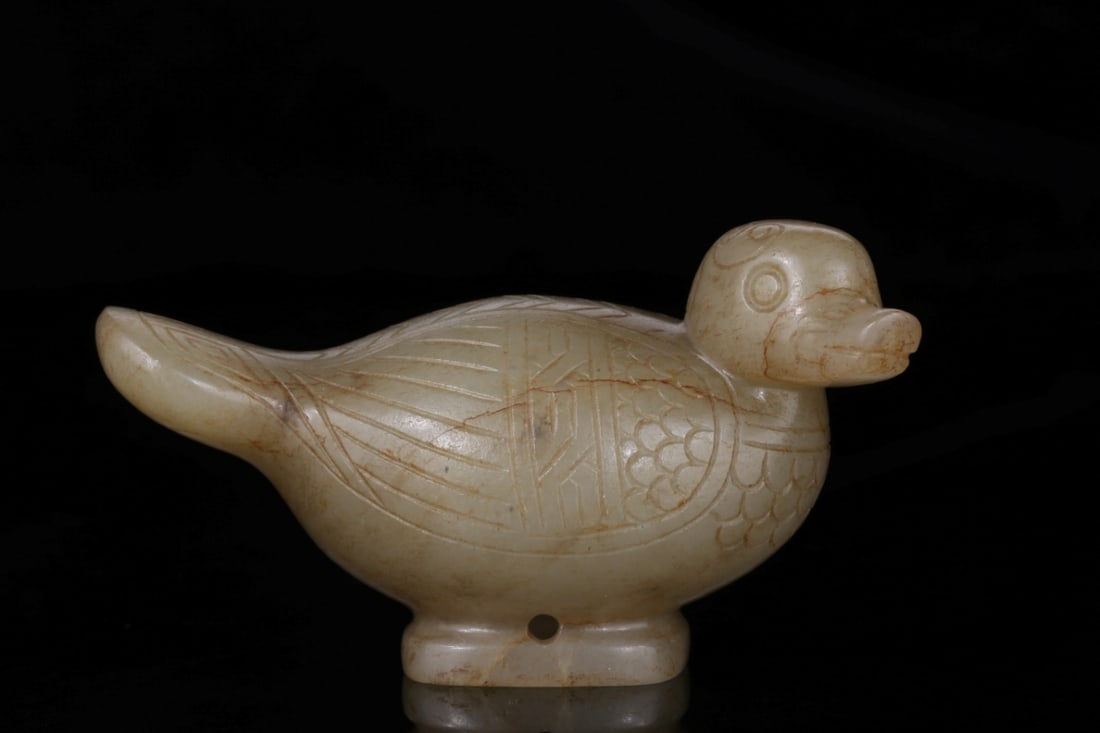 A Exquisite Hotan Jade Duck Scepter Head: A Exquisite Hotan Jade Duck Scepter Head,Qing Dynasty, China,Size:2.7inx1.4inx1.6in,Weight:97.7g 和田玉鸭权杖头,中国清代