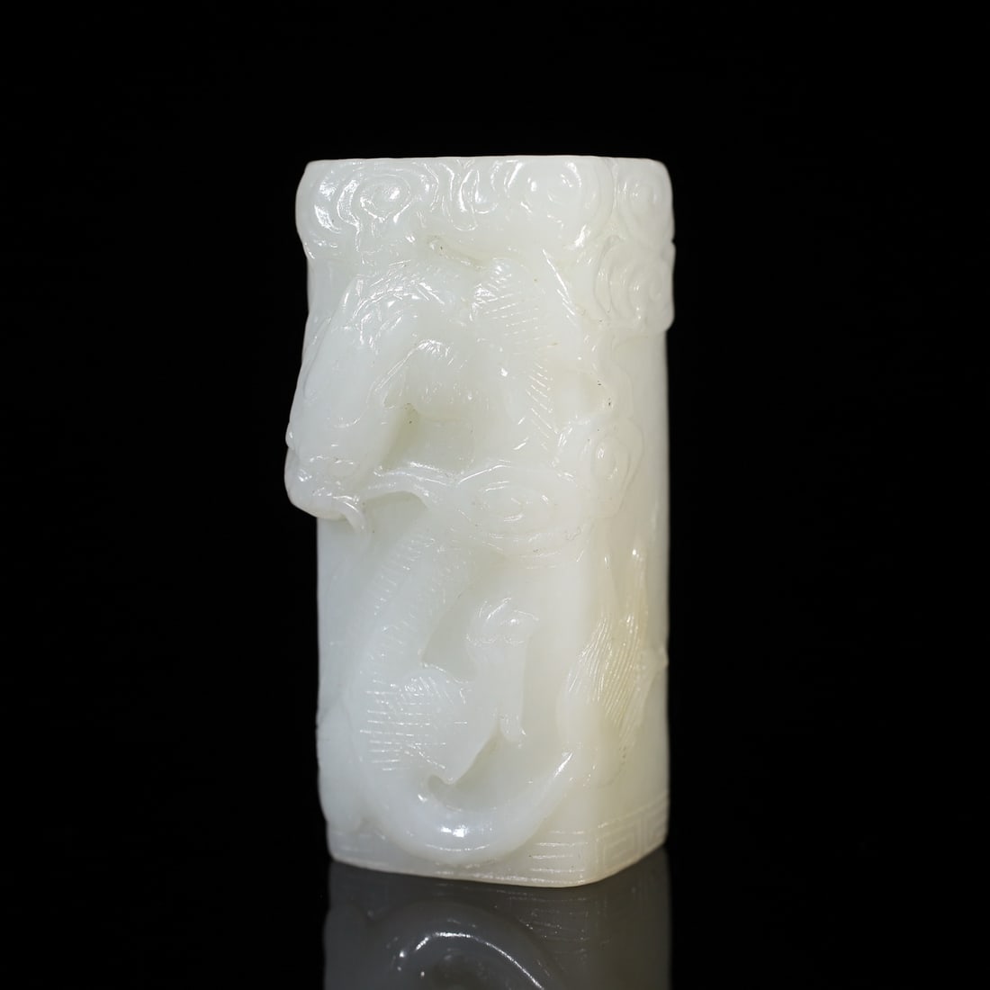 A Exquisite Hotan Jade Dragon Ornament: A Exquisite Hotan Jade Dragon Ornament,Qing Dynasty, China,Size:2.6inx1.2inx1.1in,Weight:126g 和田玉龙饰品,中国清代